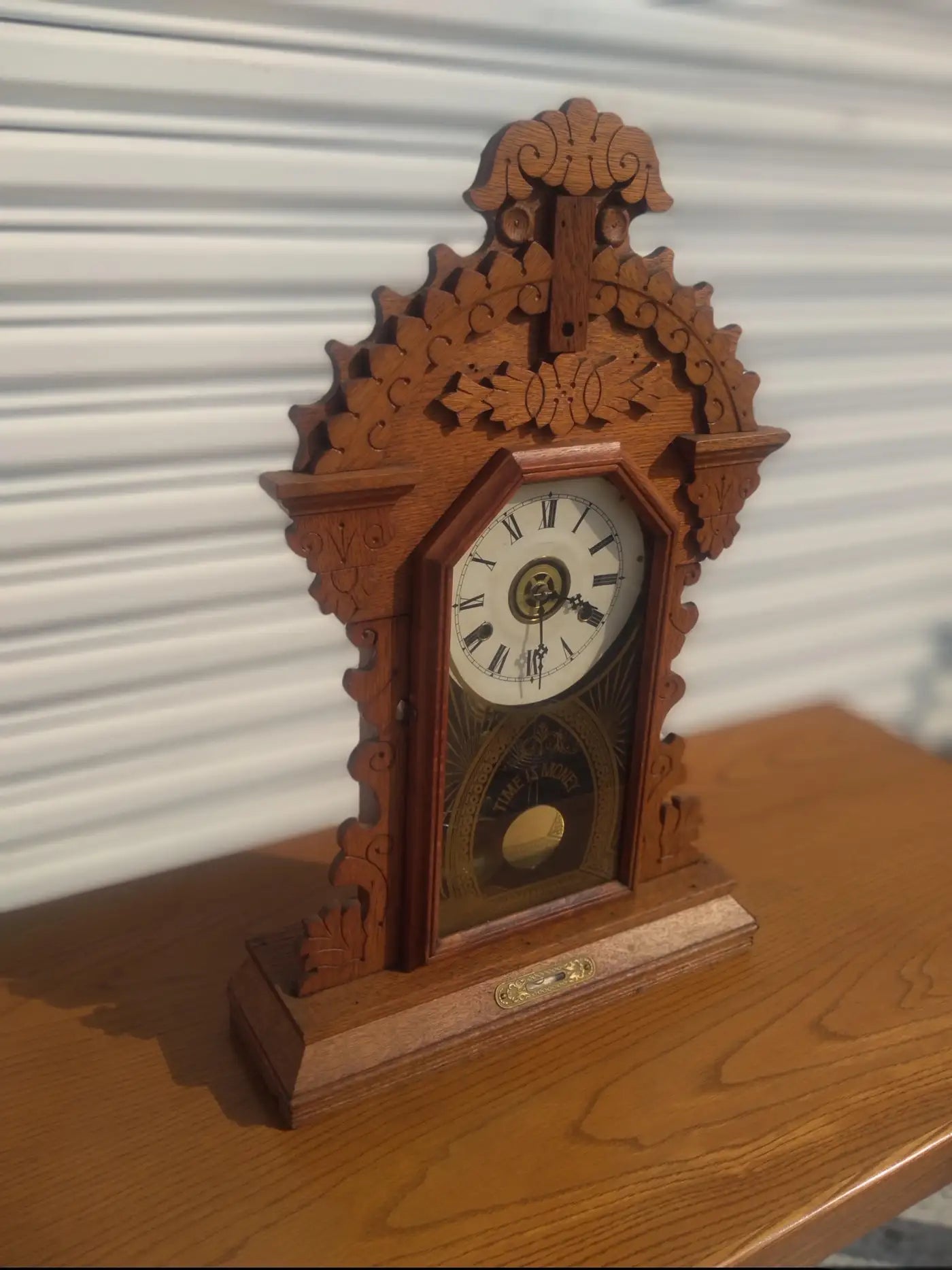 Collectible 19th-century walnut gingerbread clock