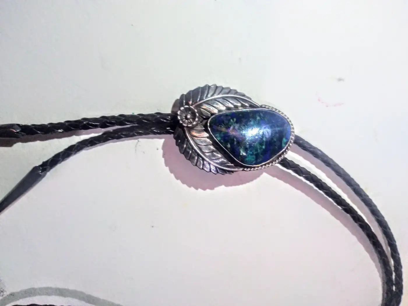 Sterling silver bolo tie with blue opal and leather