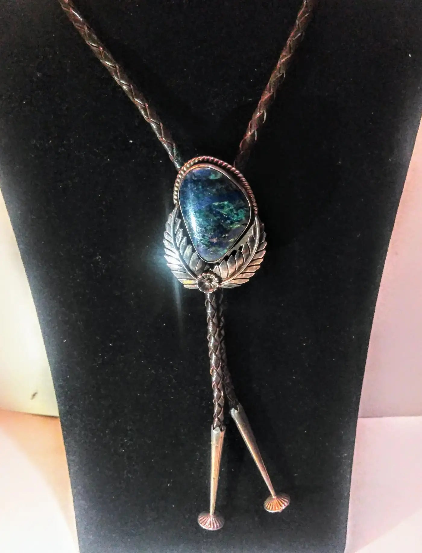 Handcrafted Native American bolo tie with blue opal medalli