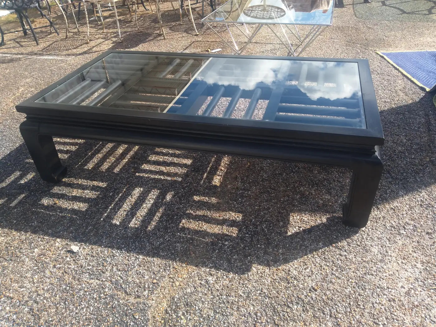 High-end ebonized Ming style coffee table with intricate design