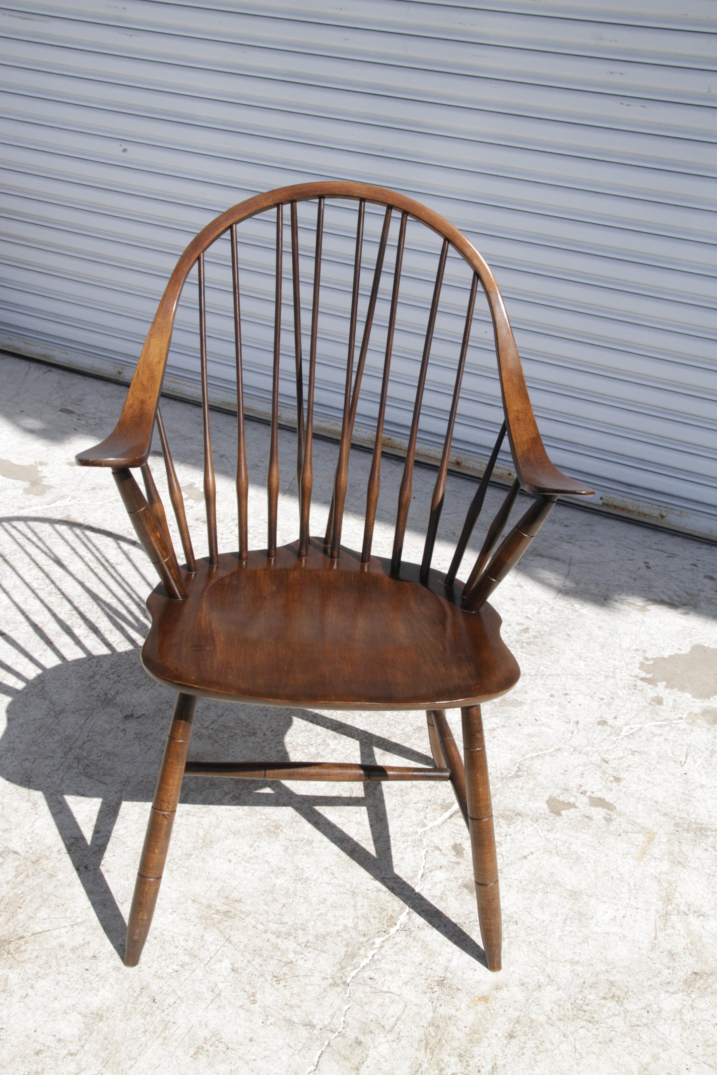 Handcrafted Windsor armchair perfect as a maple dining chair with spindle back design