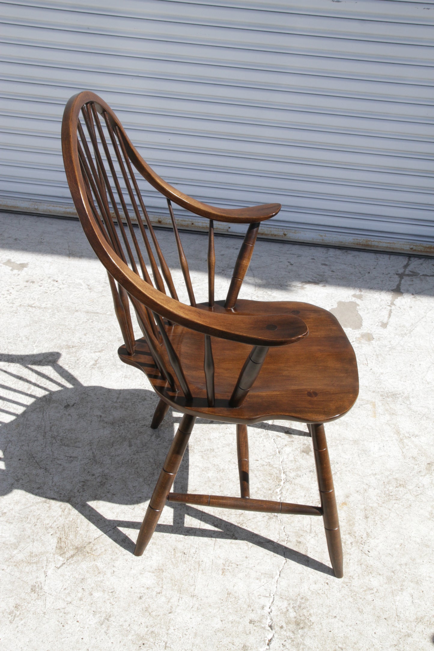 Windsor-style dining chair with arms and spindle back from Metro Retro Furniture
