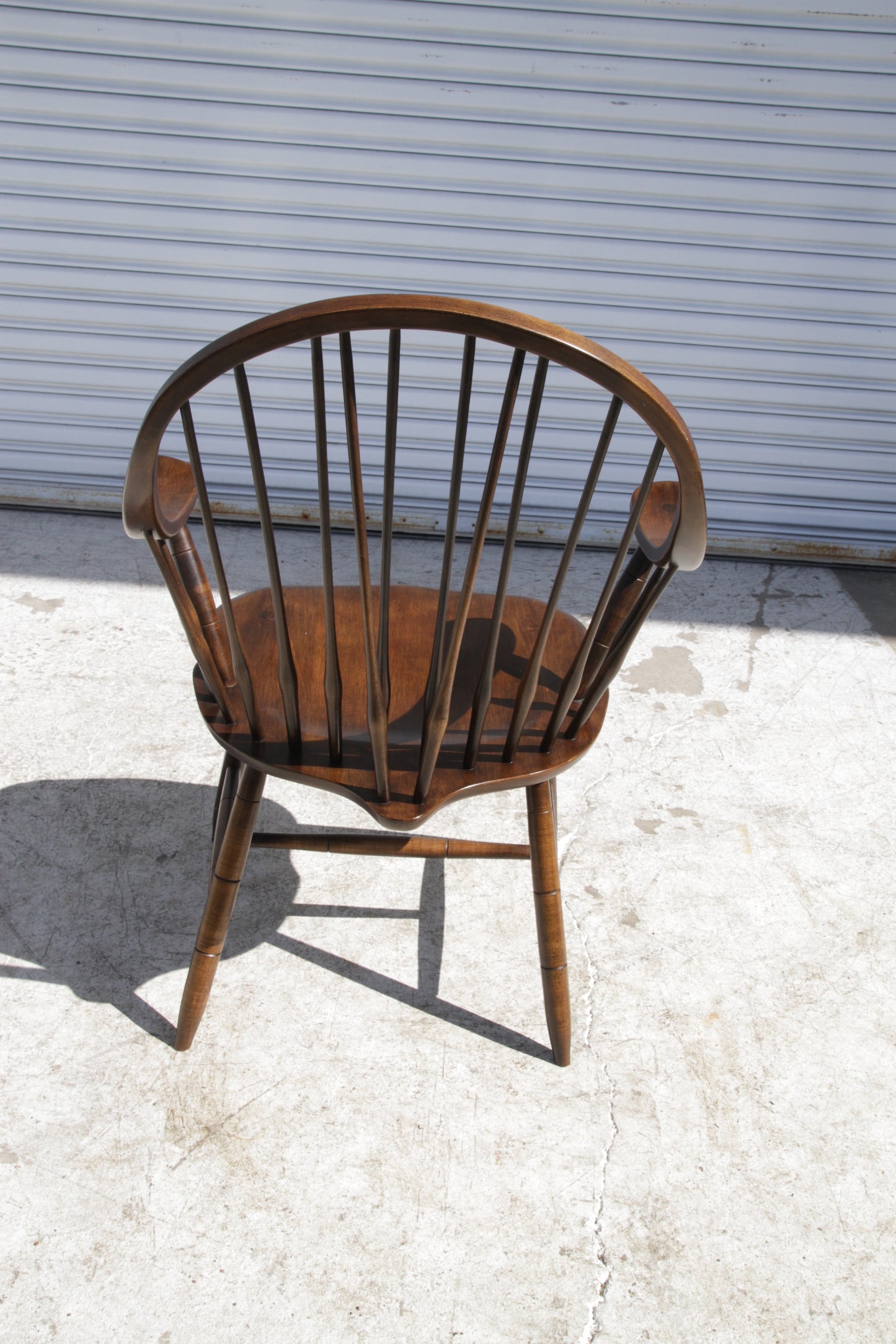 Spindle back Windsor armchair perfect for dining spaces or rustic interiors