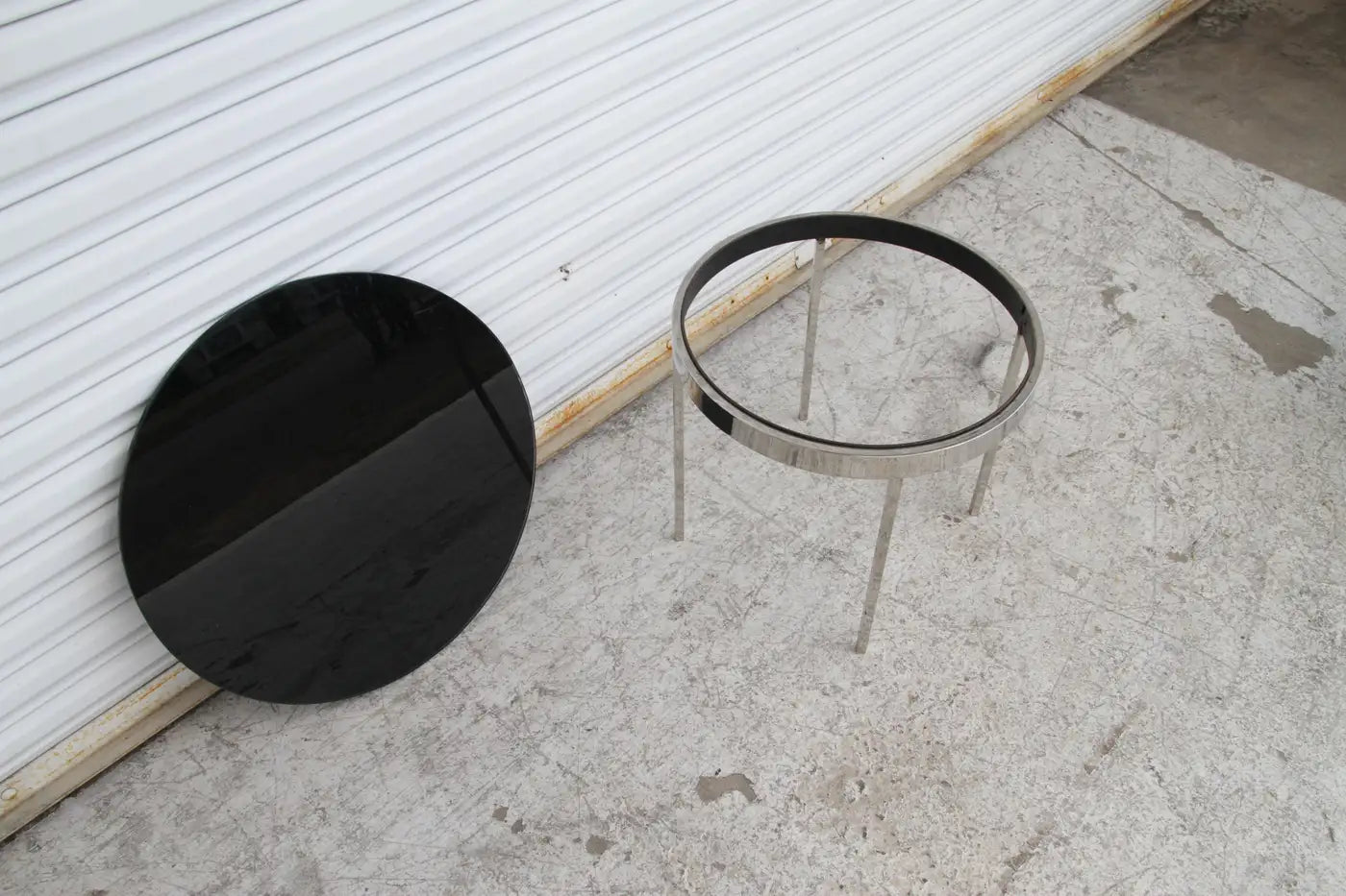 Smoked glass top side tables in mid century style