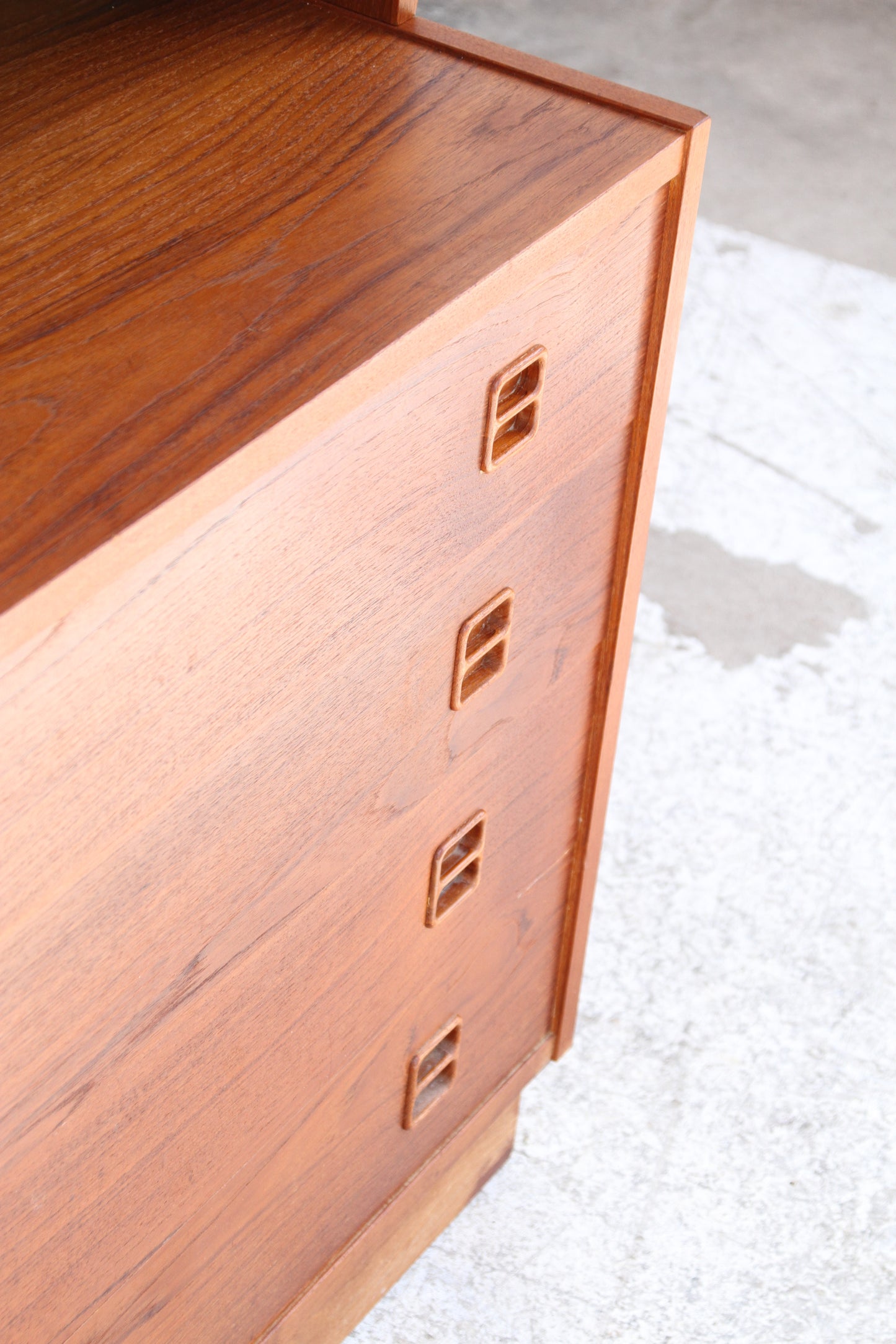 Retro desk with drawers above a classic wooden drawer chest