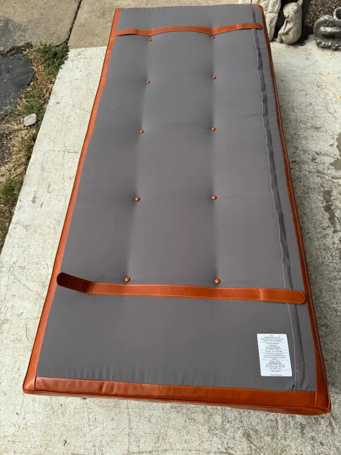 Leather tufted daybed detail