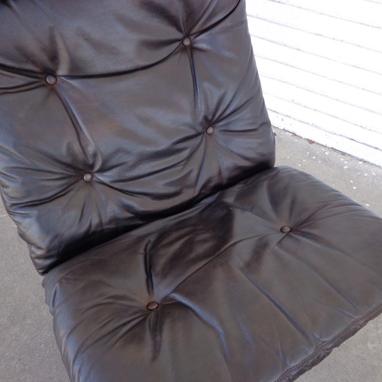 Designer rosewood lounge chair and ottoman
