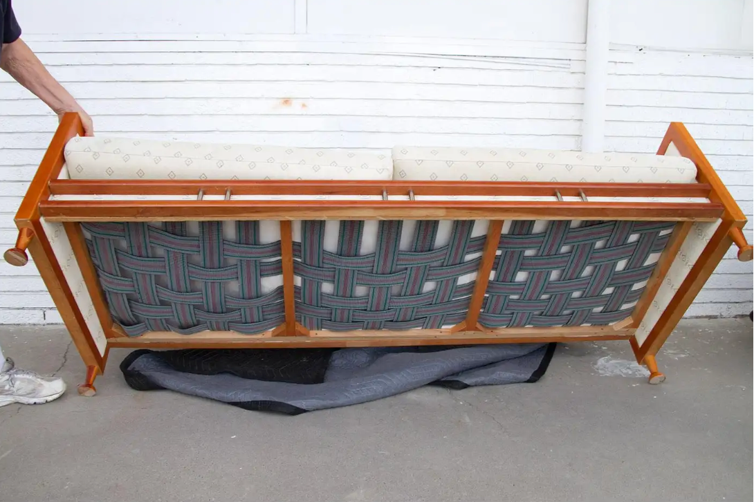 Handcrafted mid-century Spanish teak sofa