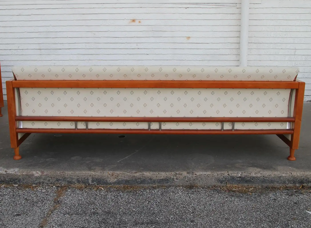 Teak mid-century couch perfect for modern decor