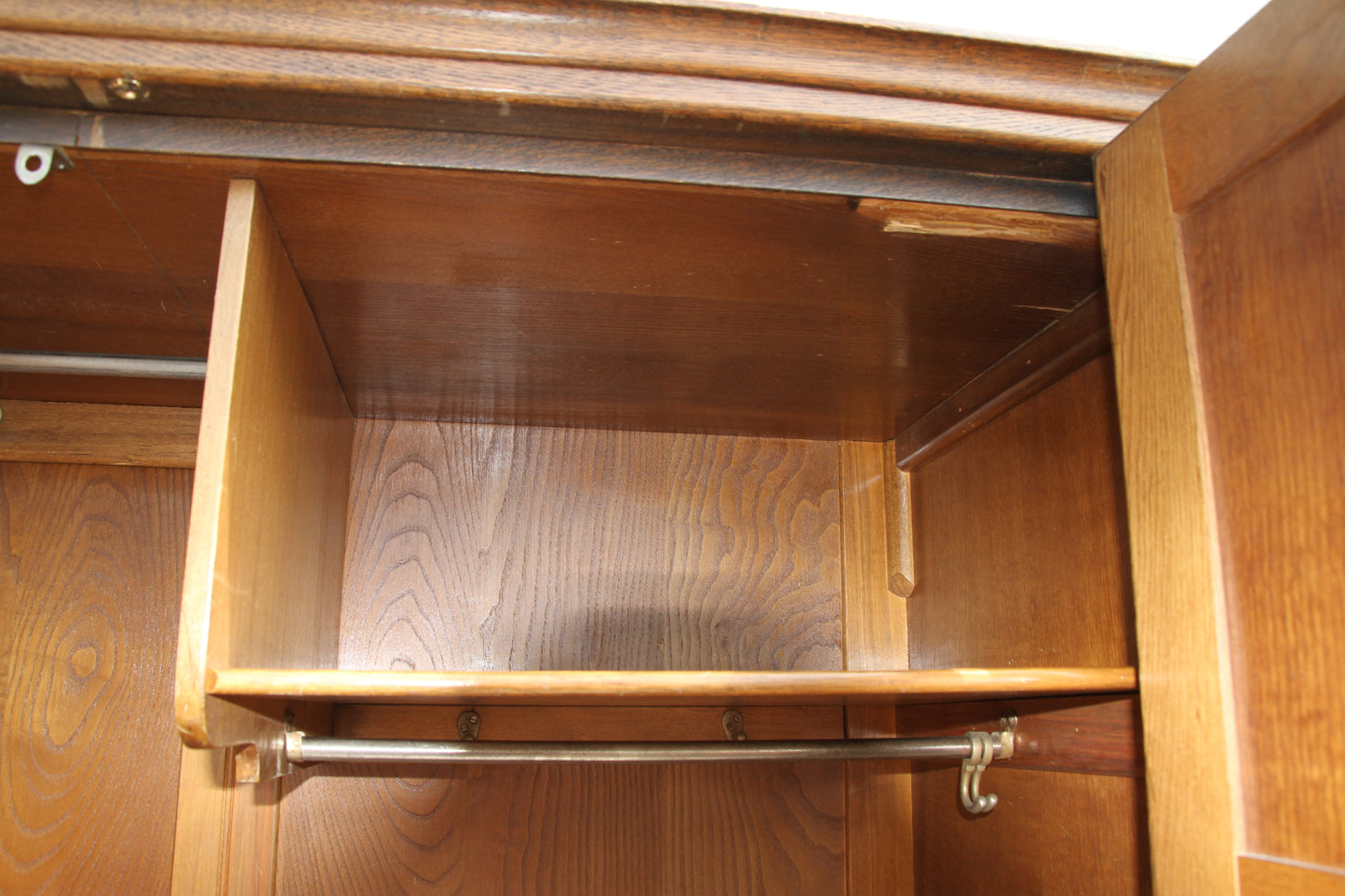 Elevate your storage game with this vintage imported London wardrobe armoire. This antique cabinet offers ample space with a touch of classic charm.