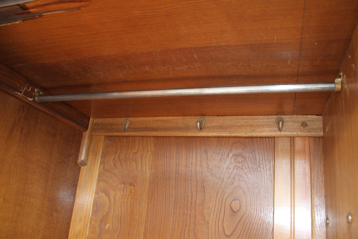 Discover the beauty of British design in this vintage imported London wardrobe armoire. A stunning antique closet that adds character to your home.