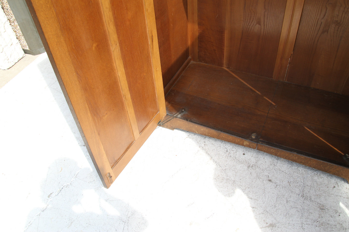 Bring a touch of history into your living space with this vintage imported London wardrobe armoire. This antique storage cabinet is a true masterpiece.
