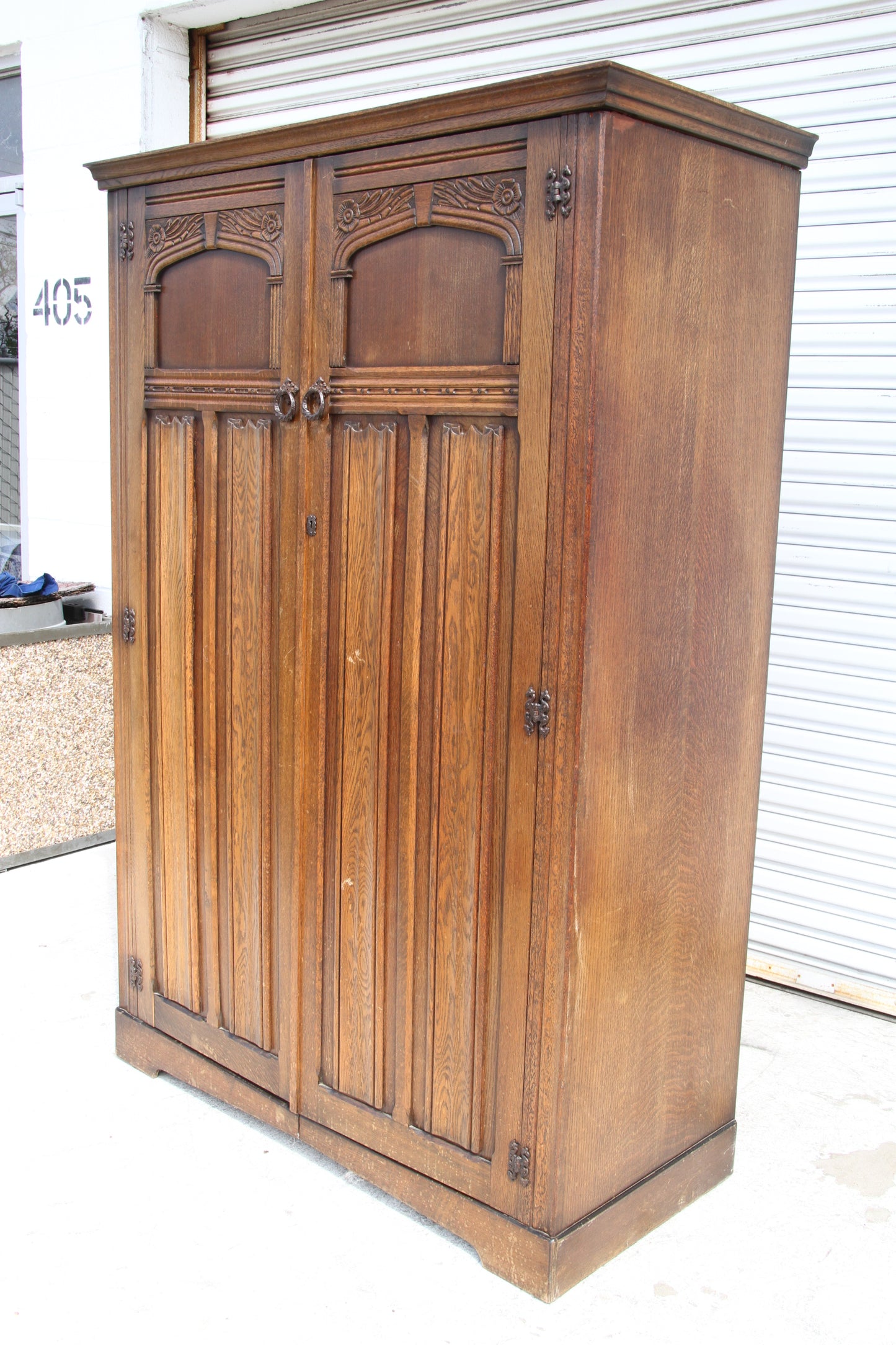 Elevate your bedroom with this vintage imported London wardrobe armoire. This antique cabinet offers ample storage with a touch of classic elegance.