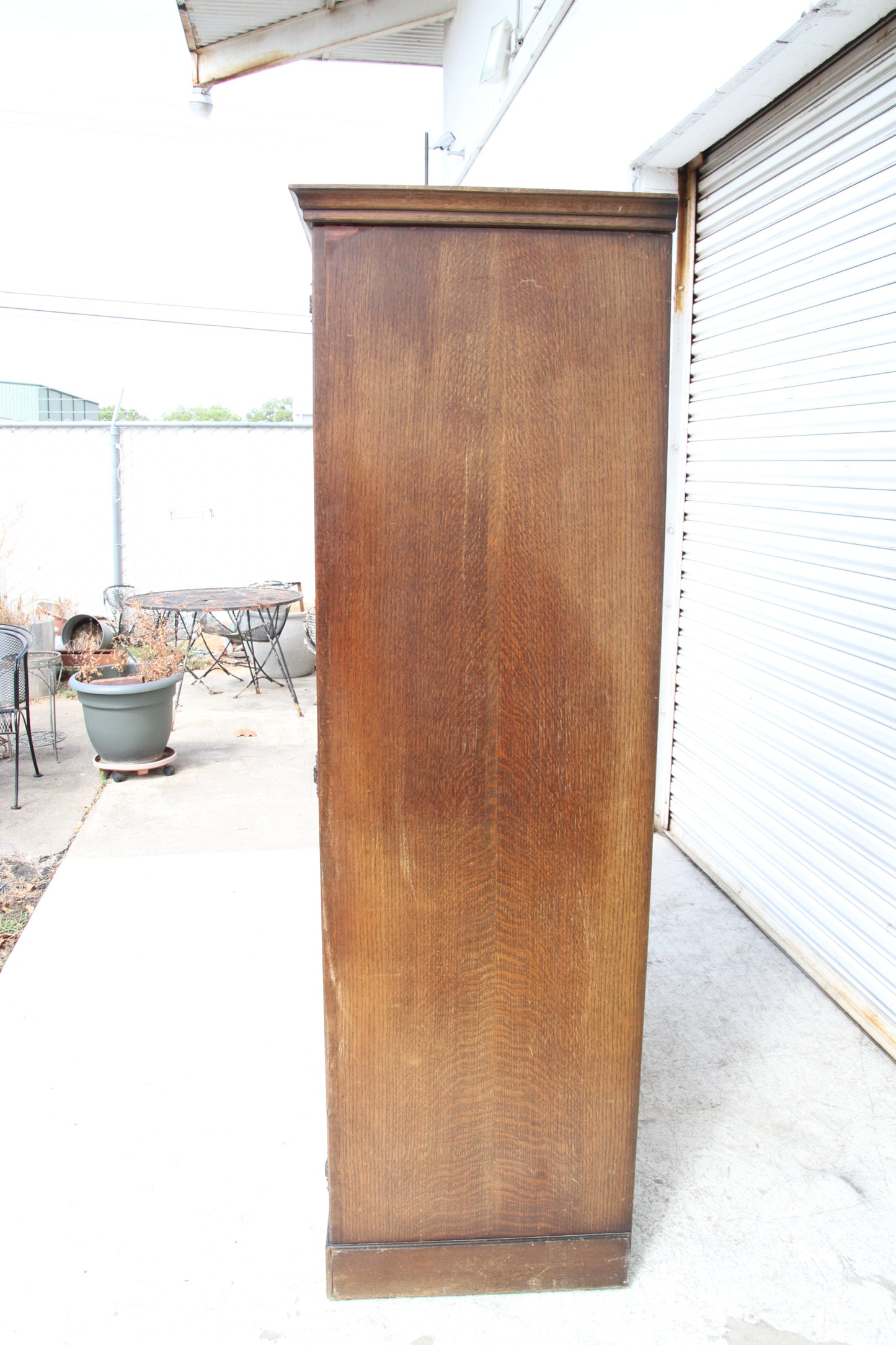 Discover the charm of British design in this vintage imported London wardrobe armoire. A beautiful antique closet that adds character to any space.