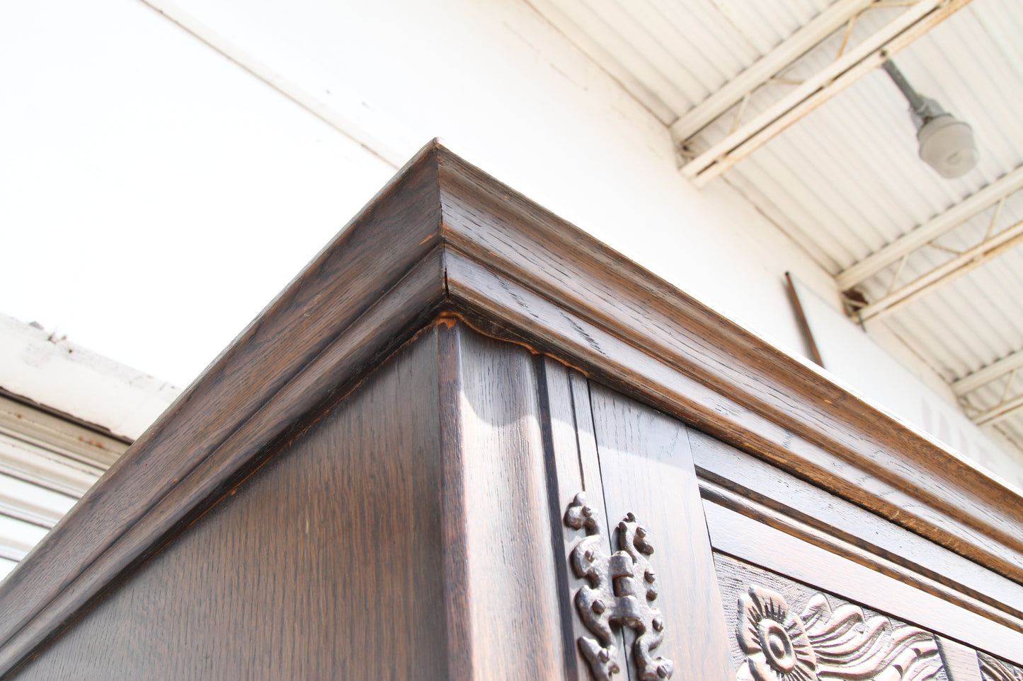 British craftsmanship with this vintage imported London wardrobe armoire. A stunning antique closet that elevates any room.