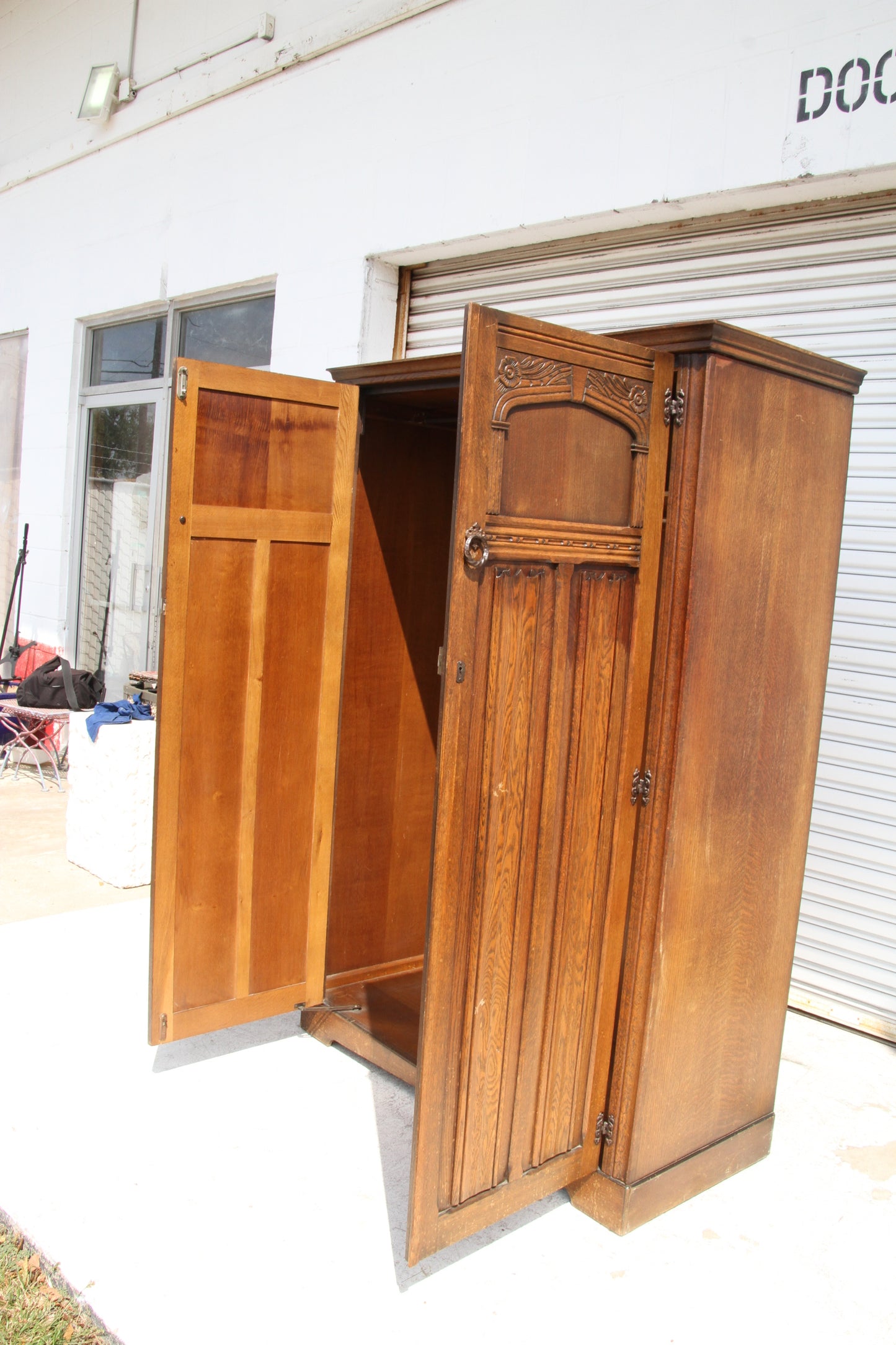 Bring a touch of history into your living space with this vintage imported London wardrobe armoire. This antique storage cabinet is a true masterpiece.
