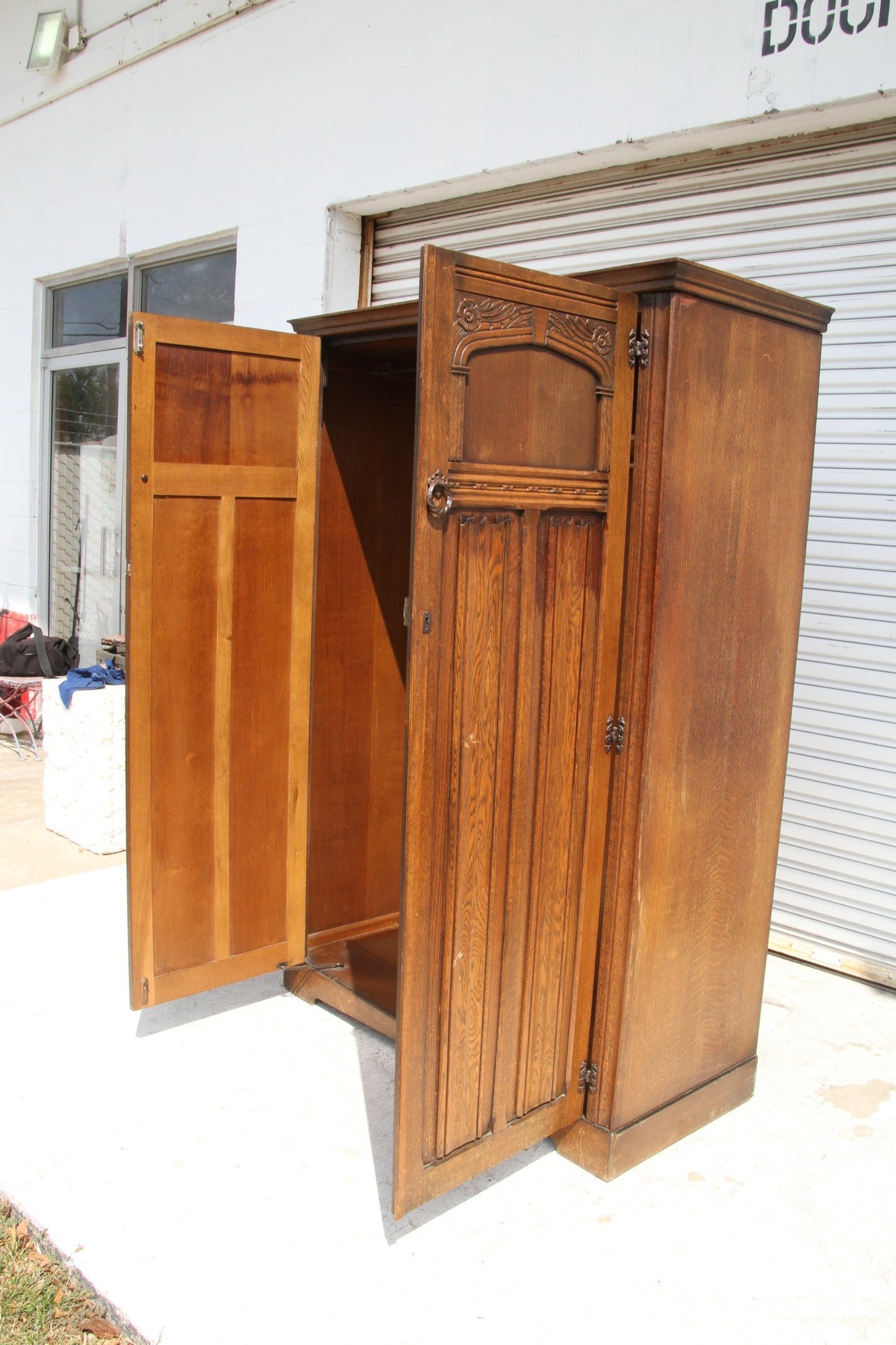 vintage imported London wardrobe armoire. This antique furniture piece offers ample storage with classic charm.