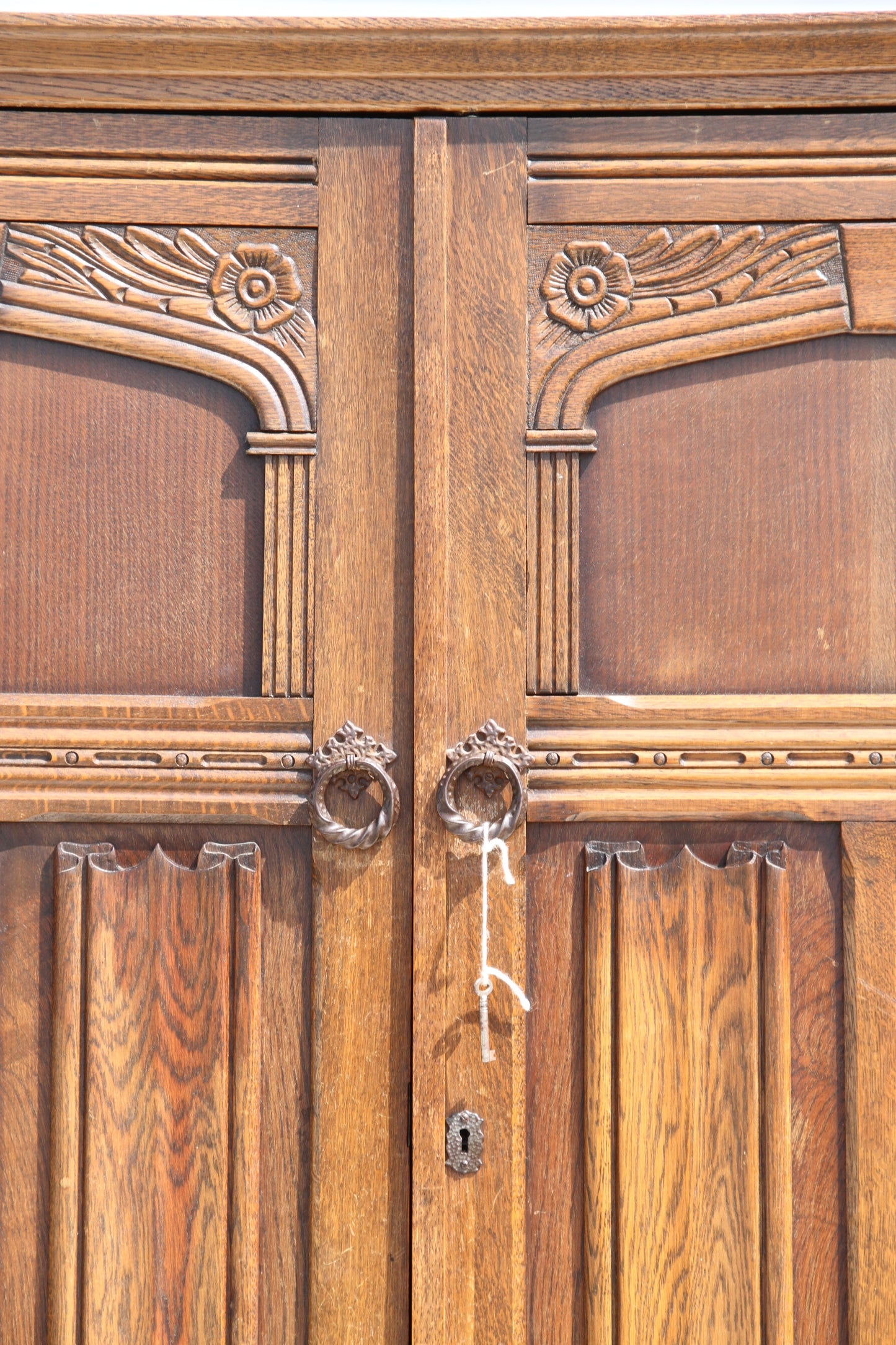 British design with this vintage imported London wardrobe armoire. A stunning antique closet that elevates any room.