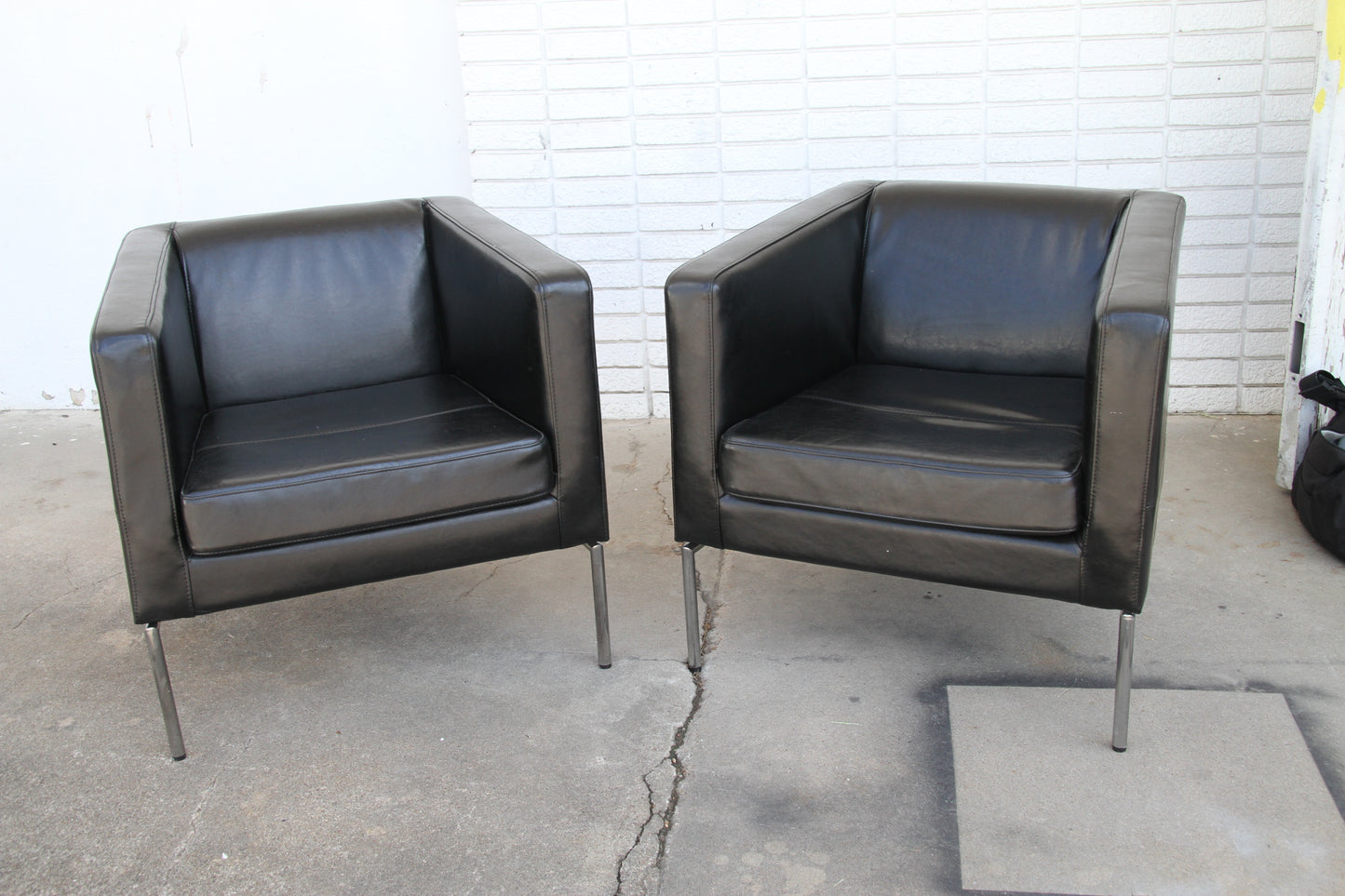 Black leather lounge chair seating area