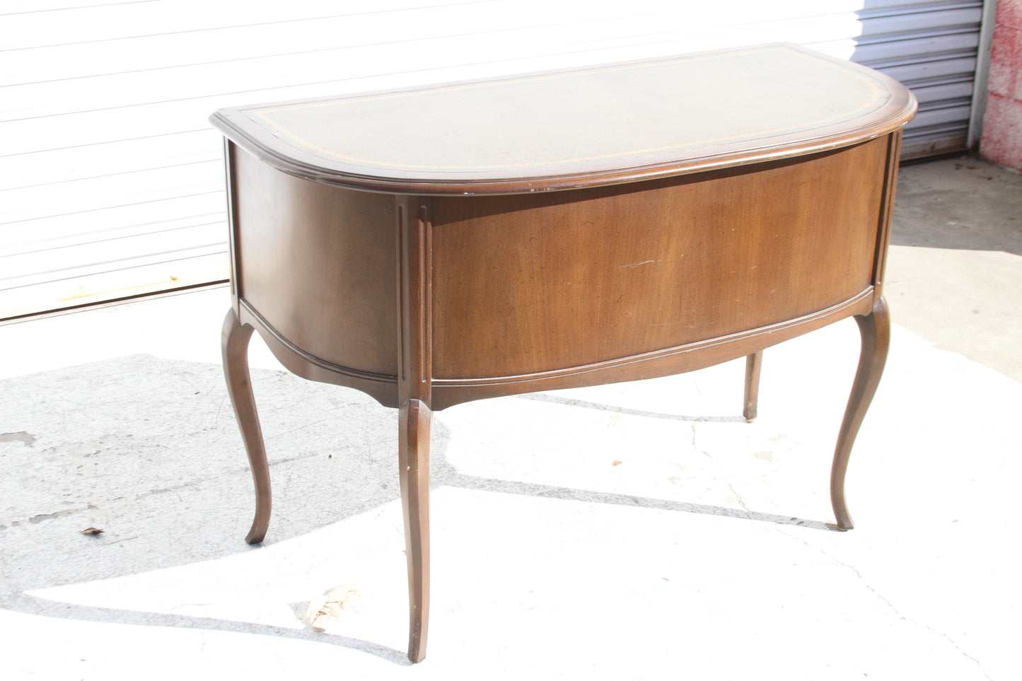 Elegant curved walnut desk