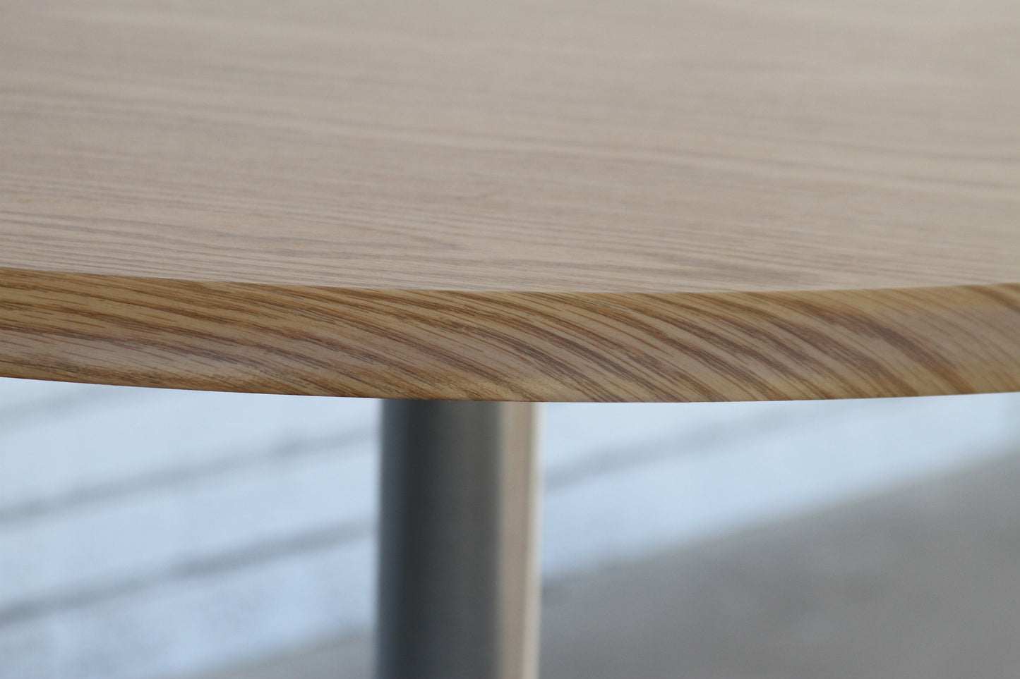 Herman Miller Laminate Round Table. Its expert design and durable laminate surface make it a focal point.