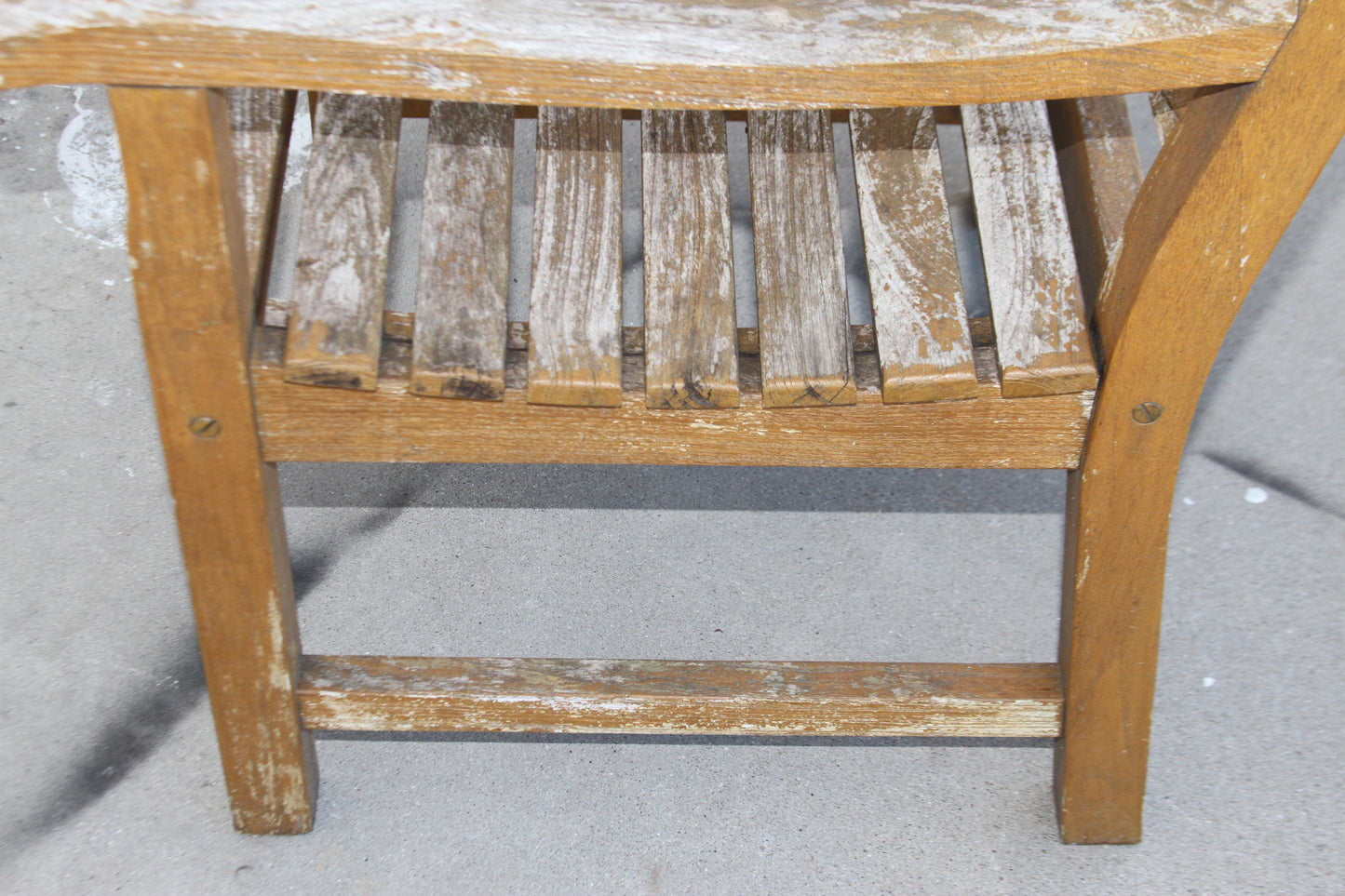 Elevate your outdoor space with the iconic lines and luxurious craftsmanship of the Teak Maritime Heritage Outdoor Bench. A true statement piece for any alfresco setting.