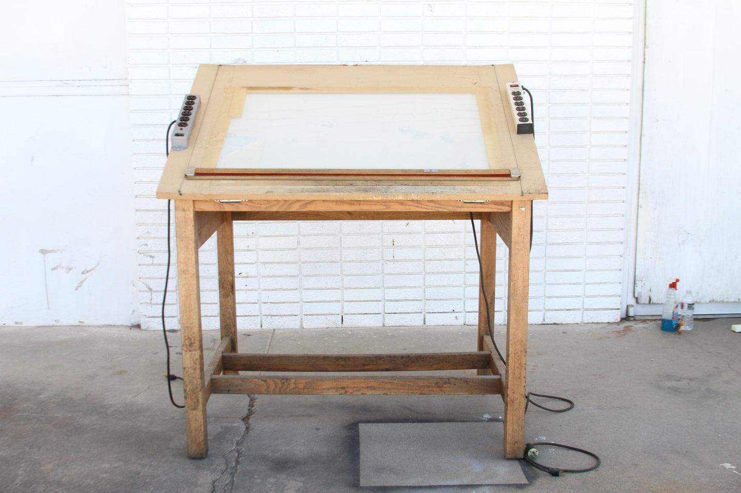 Wooden drafting surface with lamp