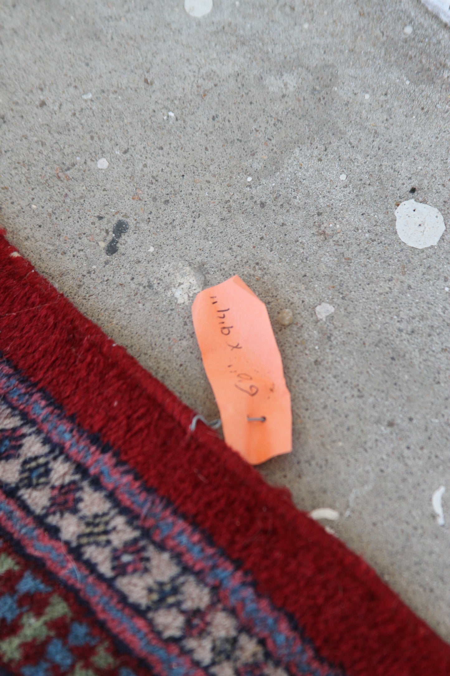 Red and white accent rug