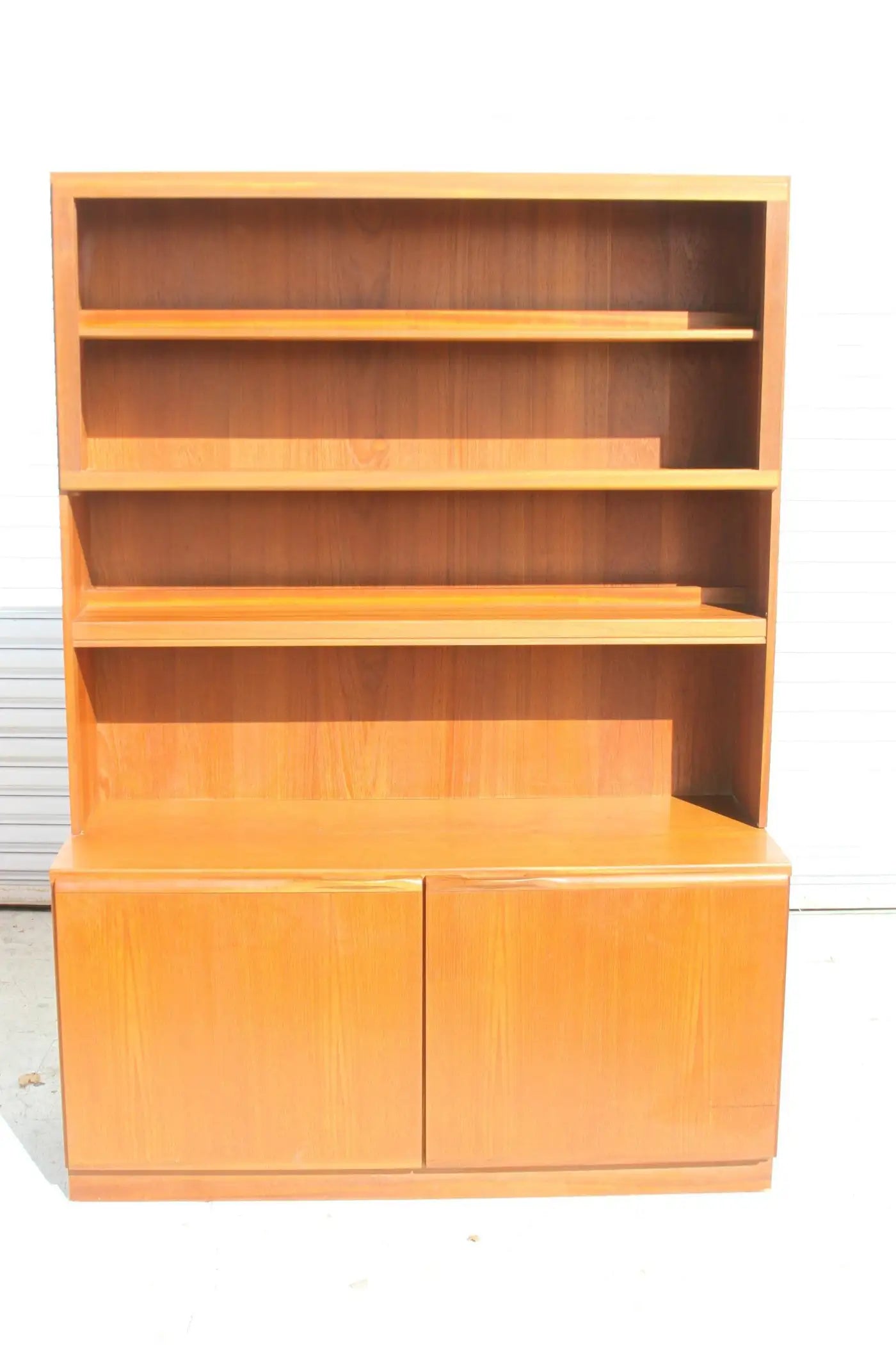 Teak wood bookcase with lower cabinet section