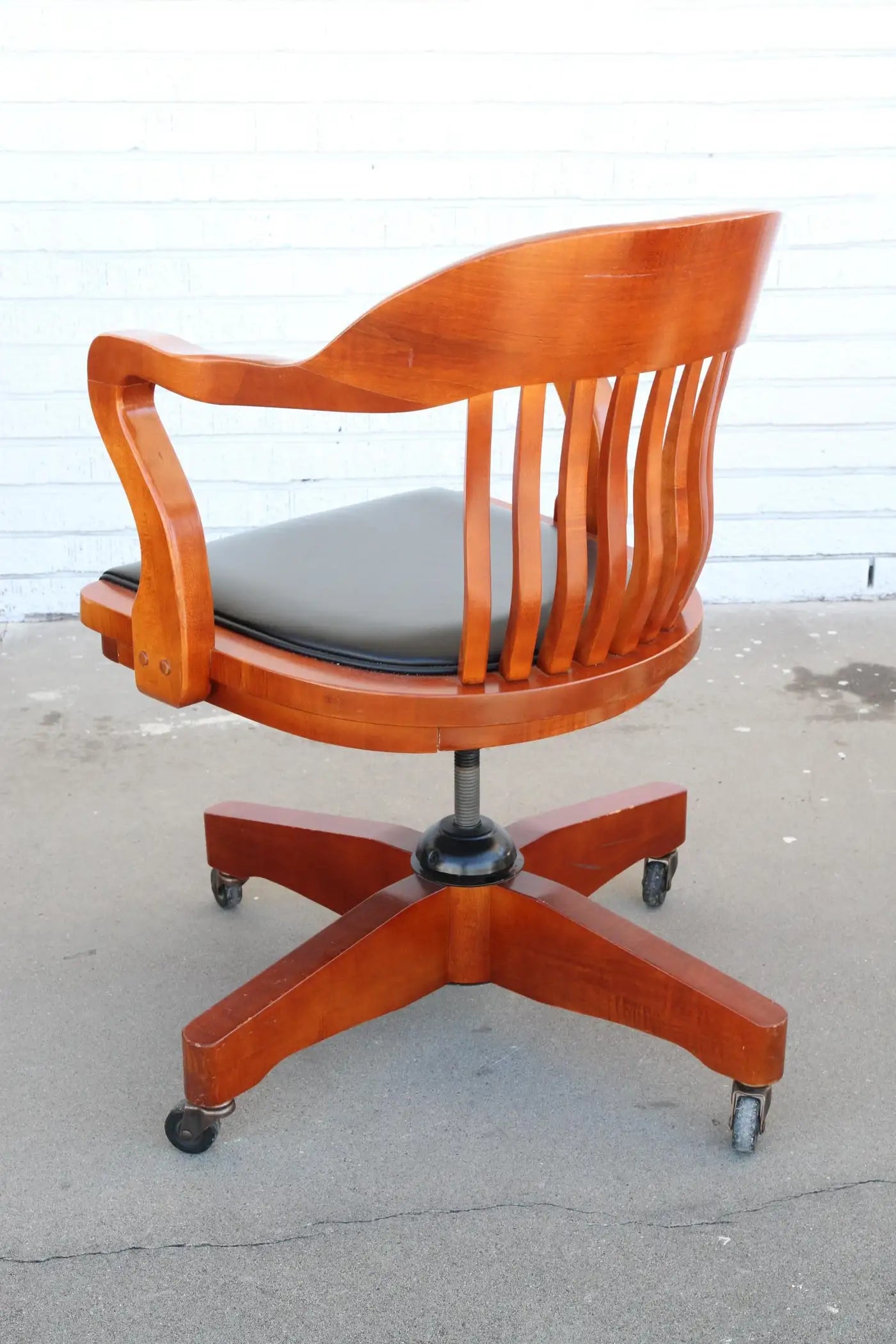 Antique banker swivel chair with casters