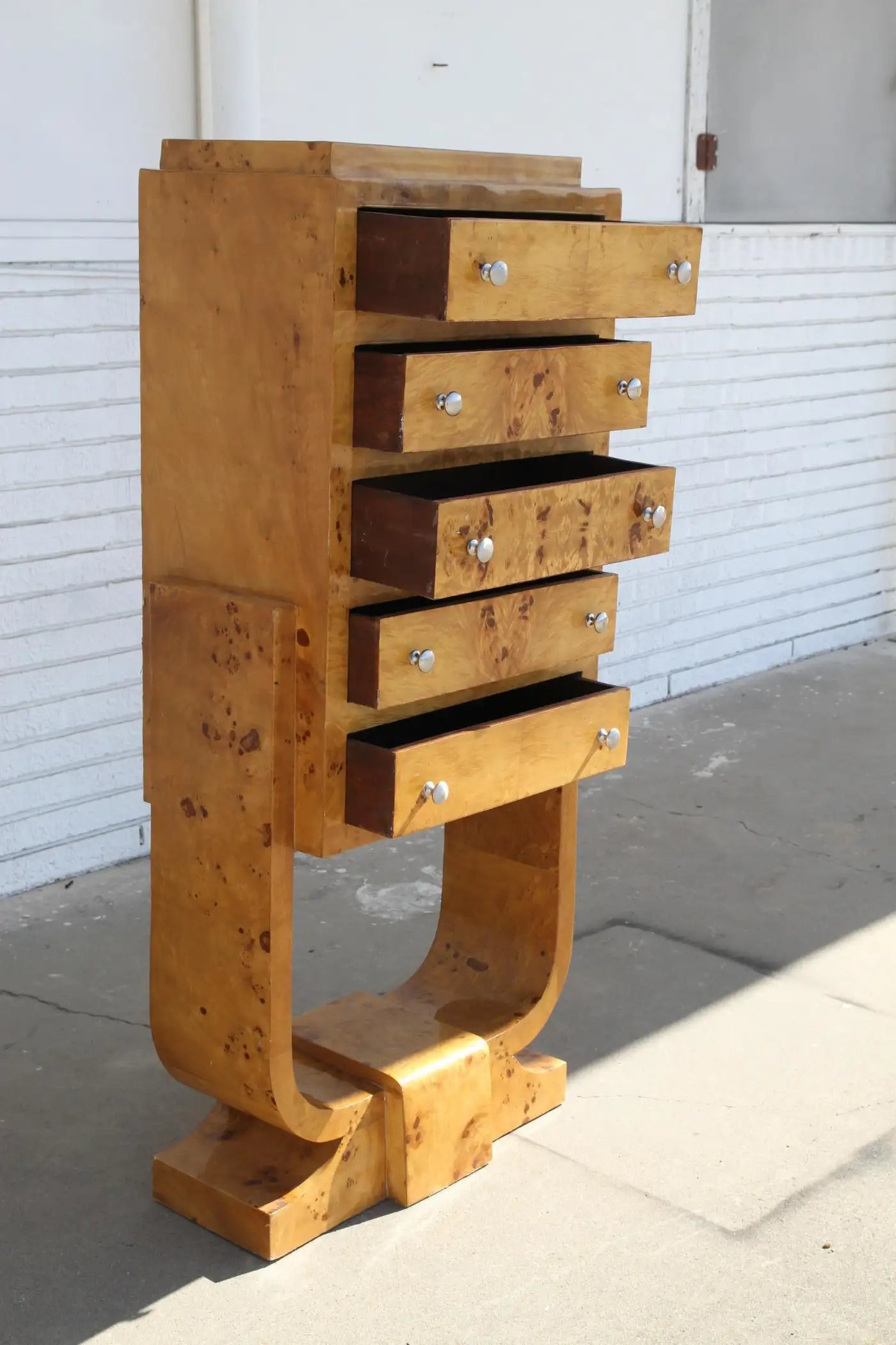 Sculptural dresser with burl wood grain texture