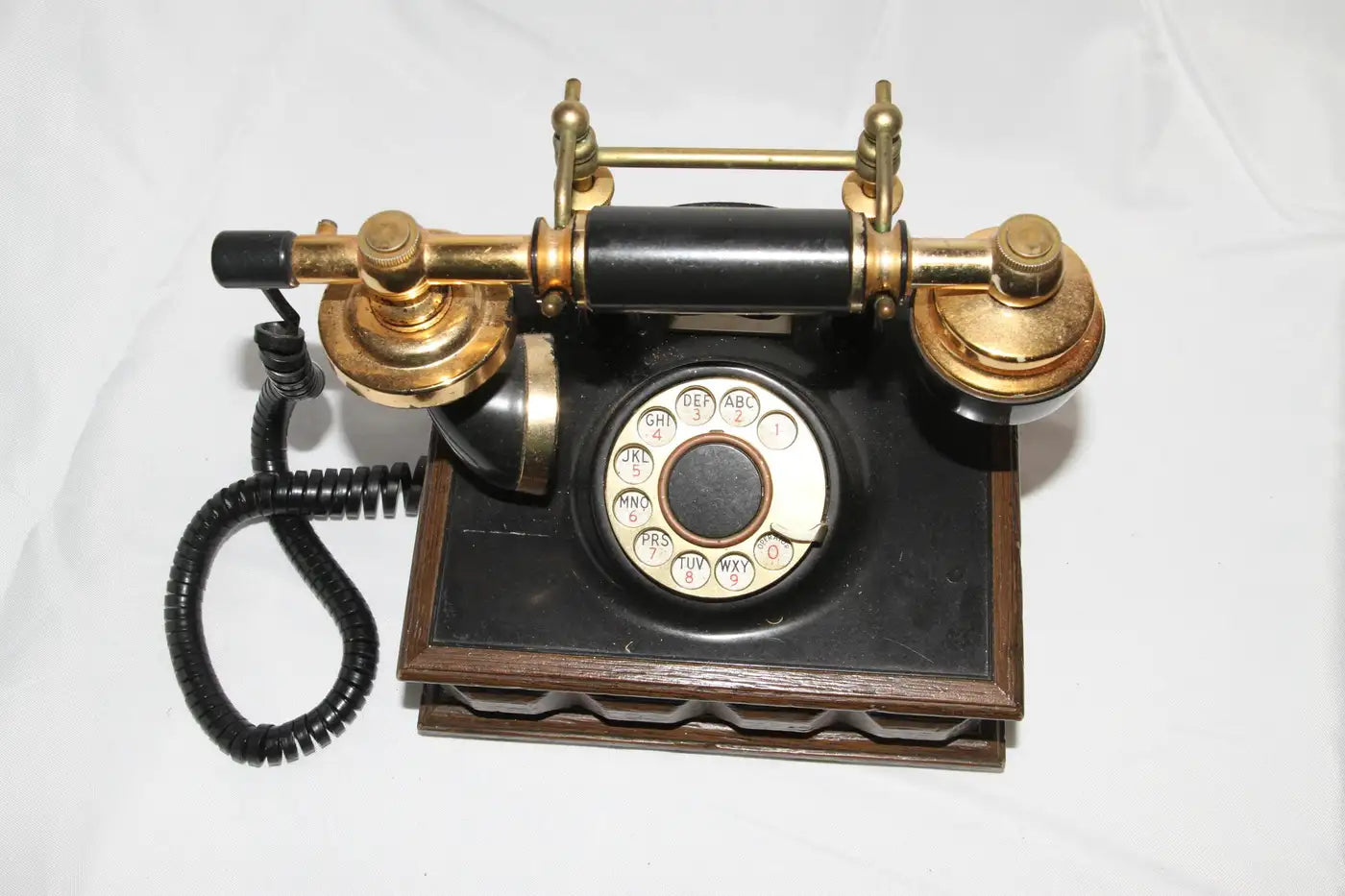 Mid-century wood rotary phone close-up