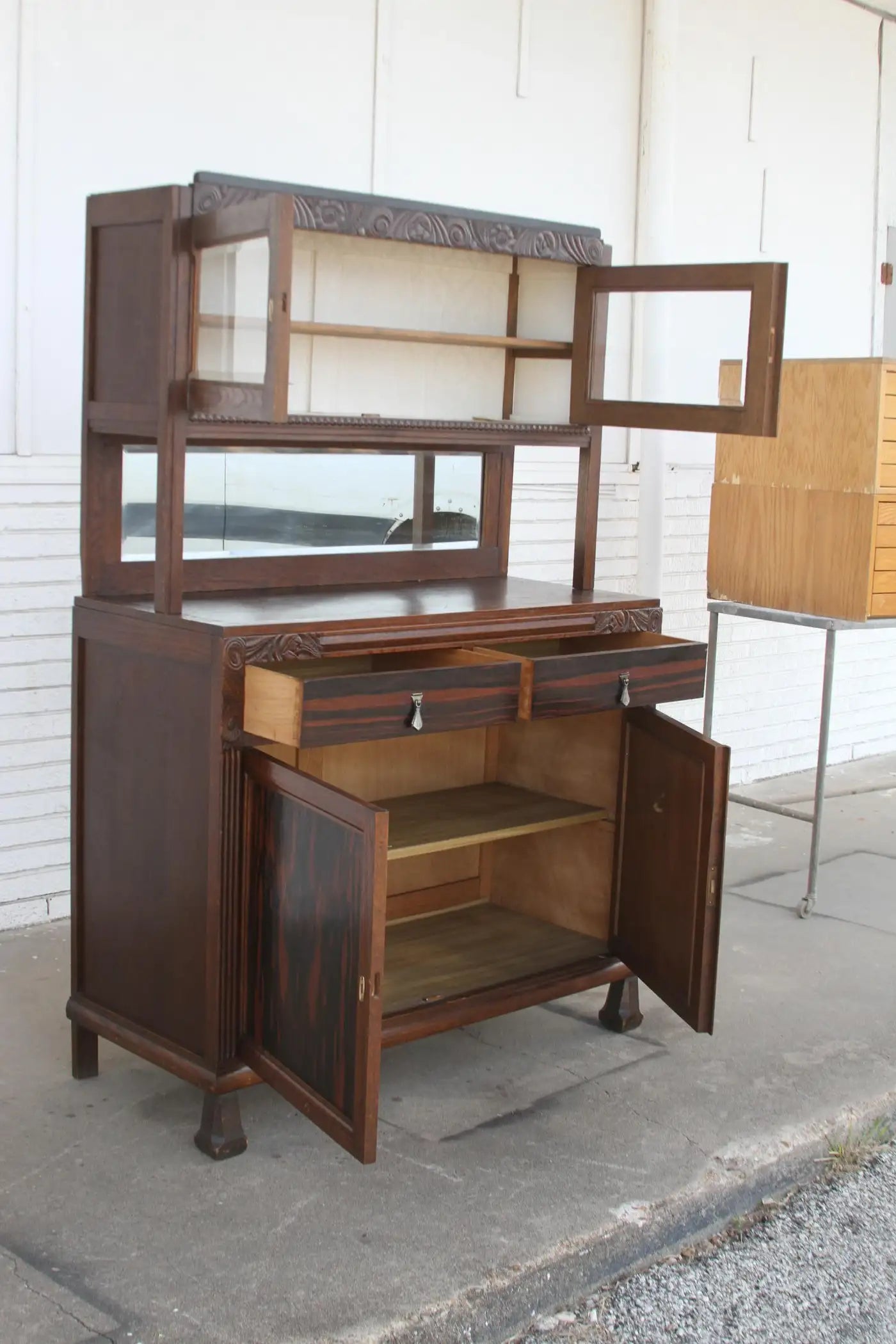 Carved antique buffet with backsplash mirror