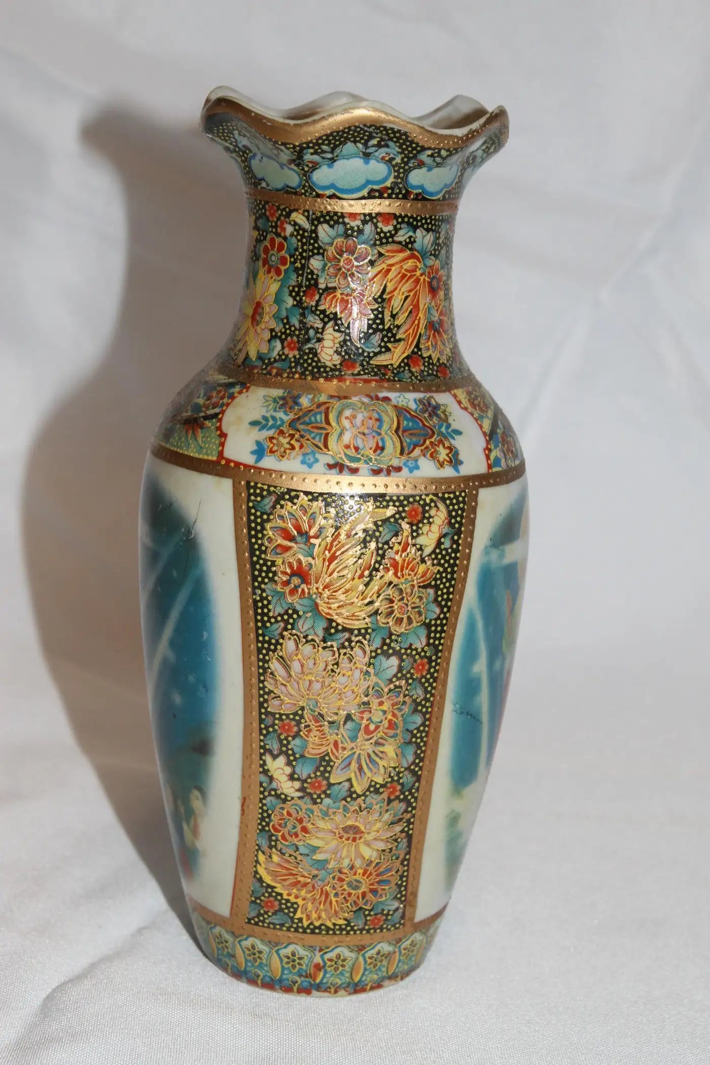 Antique Jesus pottery vase with detailed artwork