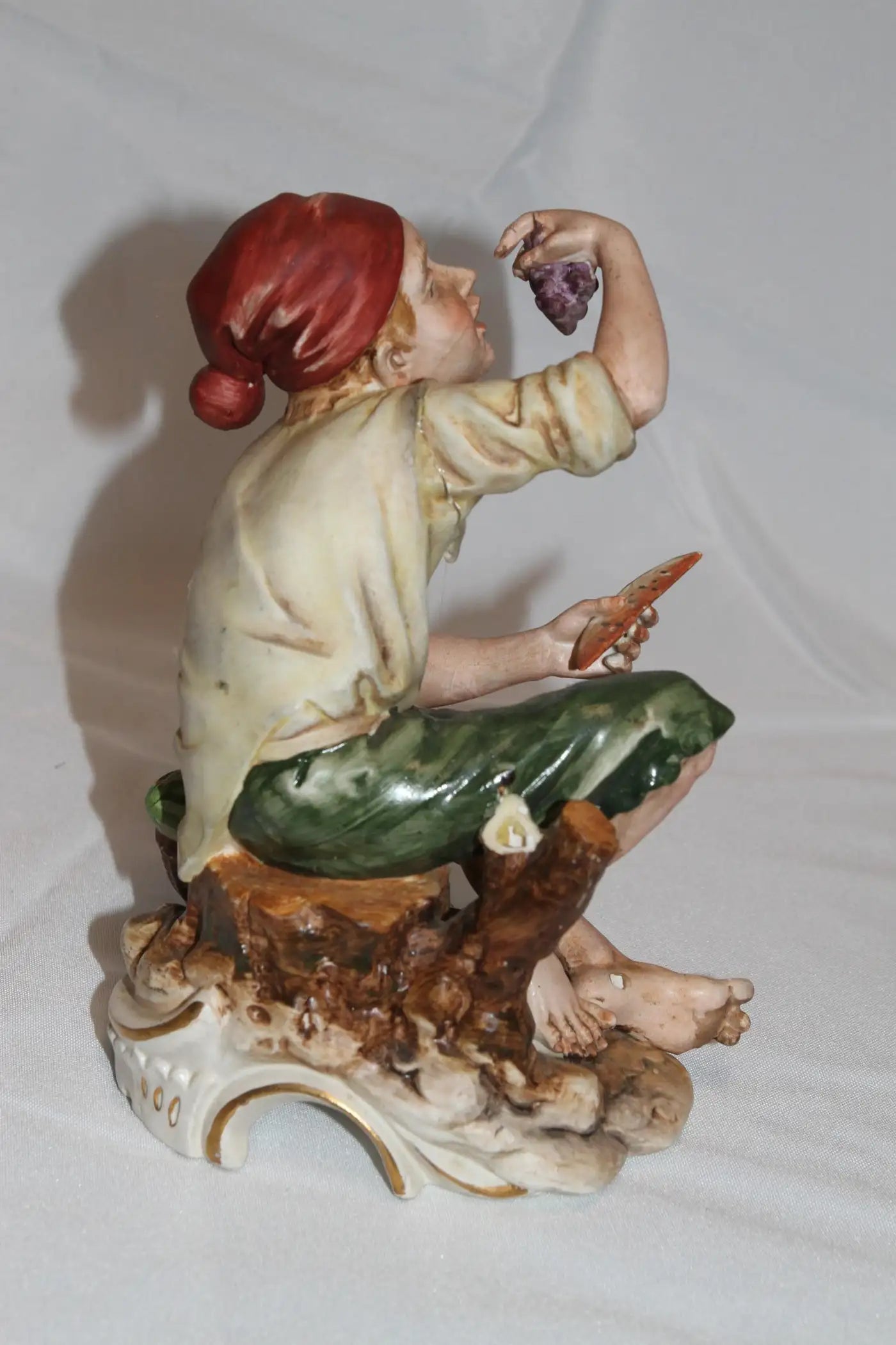 Whimsical fruit-themed man figurine