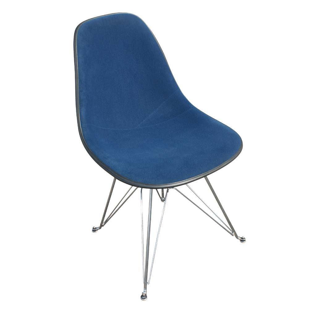 Blue in color Eames High Back Soft Pad Office Chair from Herman Miller. Experience the perfect blend of style and functionality.