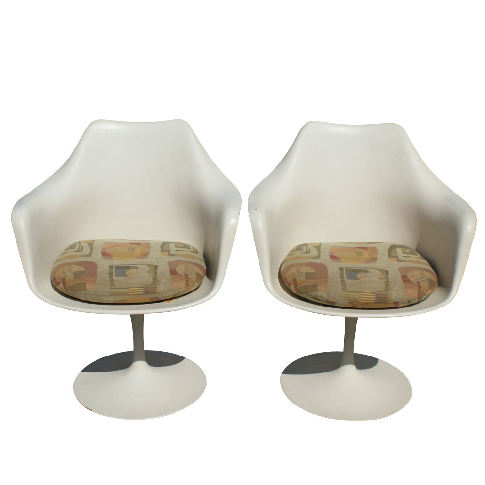 Eero Saarinen Tulip Arm Chair from Knoll, boasting iconic design elements, durable construction, and luxurious upholstery options.