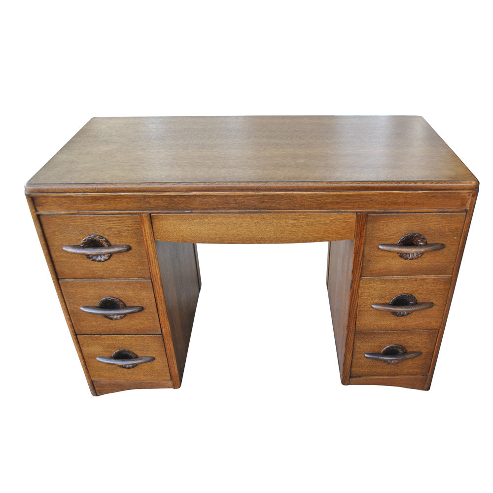 44″ vintage oak desk by Harmony House with mid century design