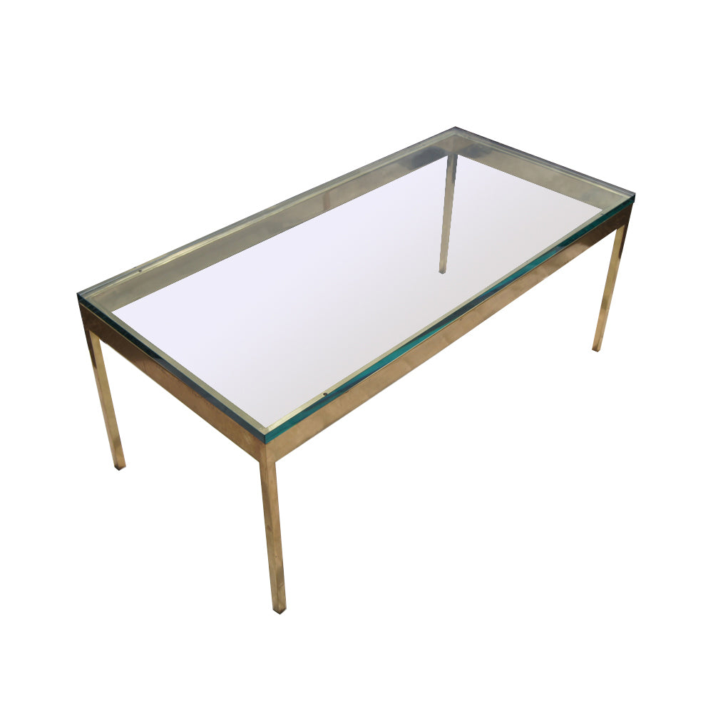 Retro brass frame coffee table with glass top and sleek design