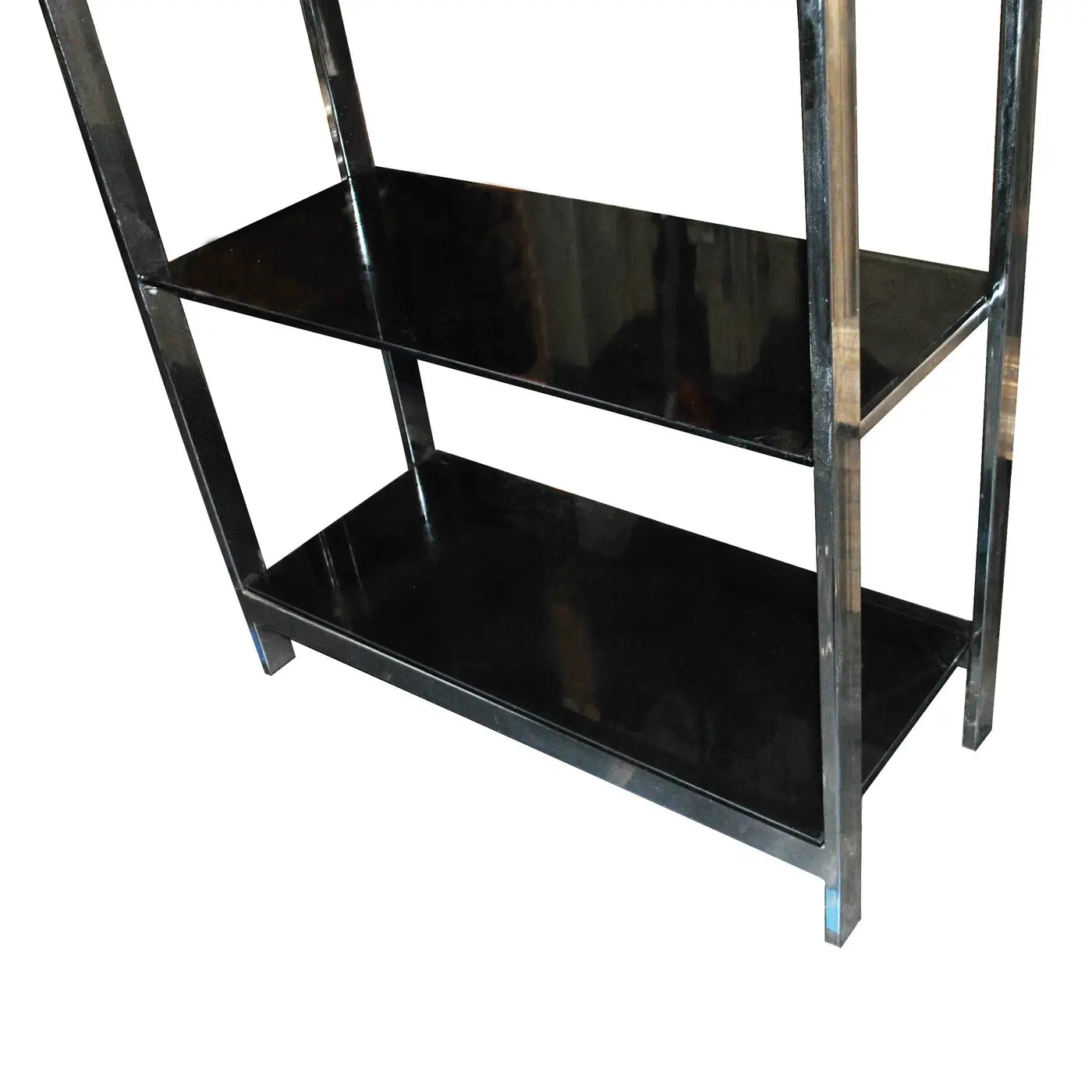 Retro chrome display shelf perfect for vintage decor.