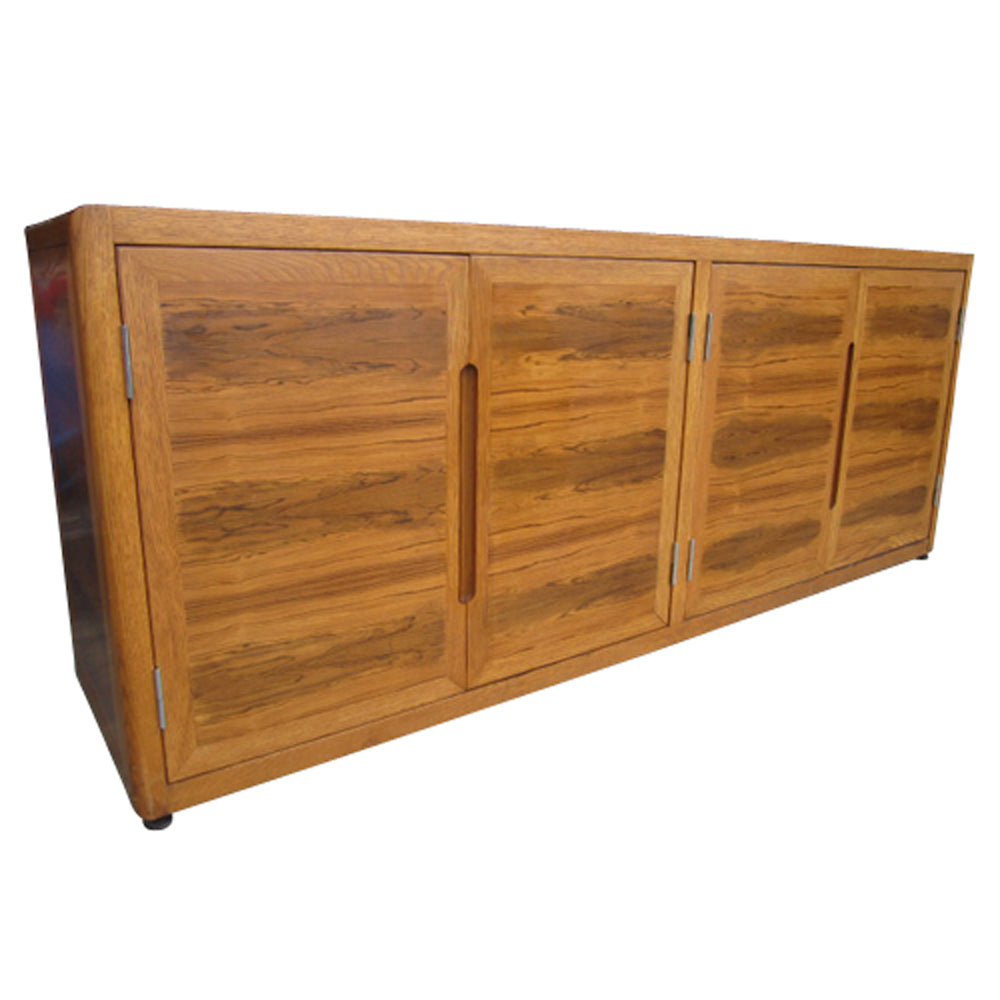 Vintage mid-century Dunbar rosewood and white oak credenza with sleek design and ample storage.