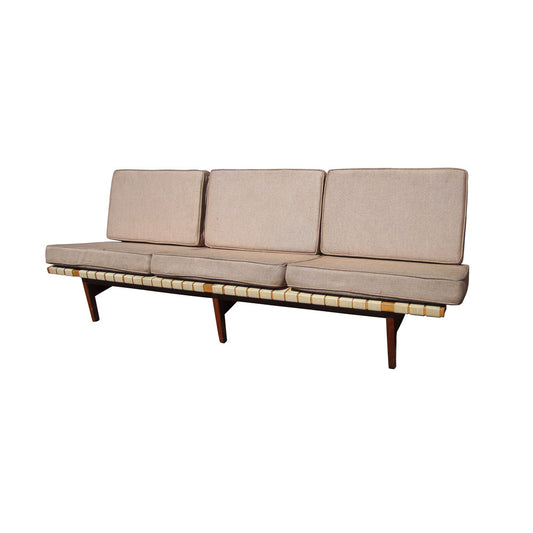 Knoll armless sofa, designed for relaxation and entertaining, ideal for lounges, reception areas, and home theaters.