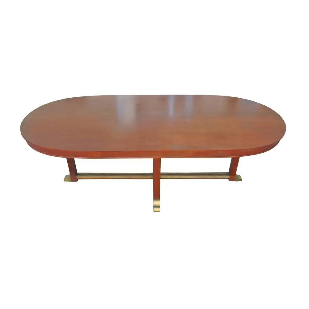 Elegant racetrack dining table with neoclassical styling