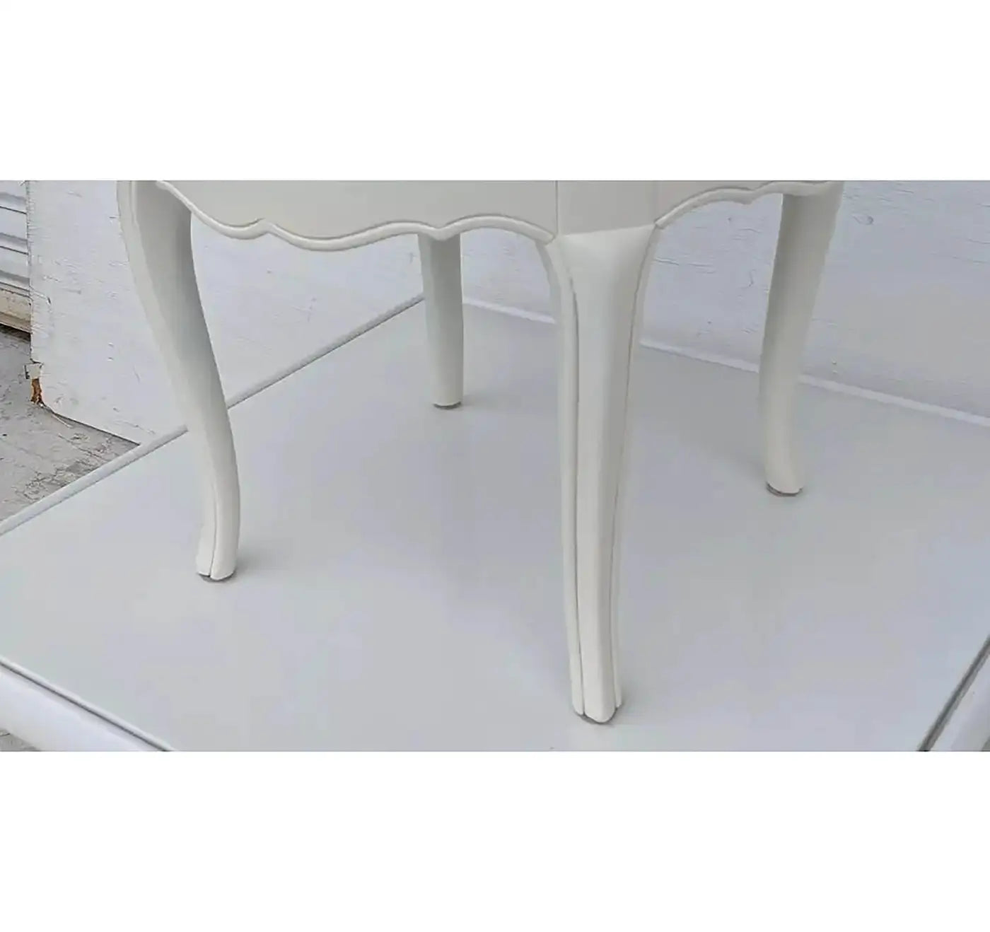 Upholstered vintage Regency ottoman