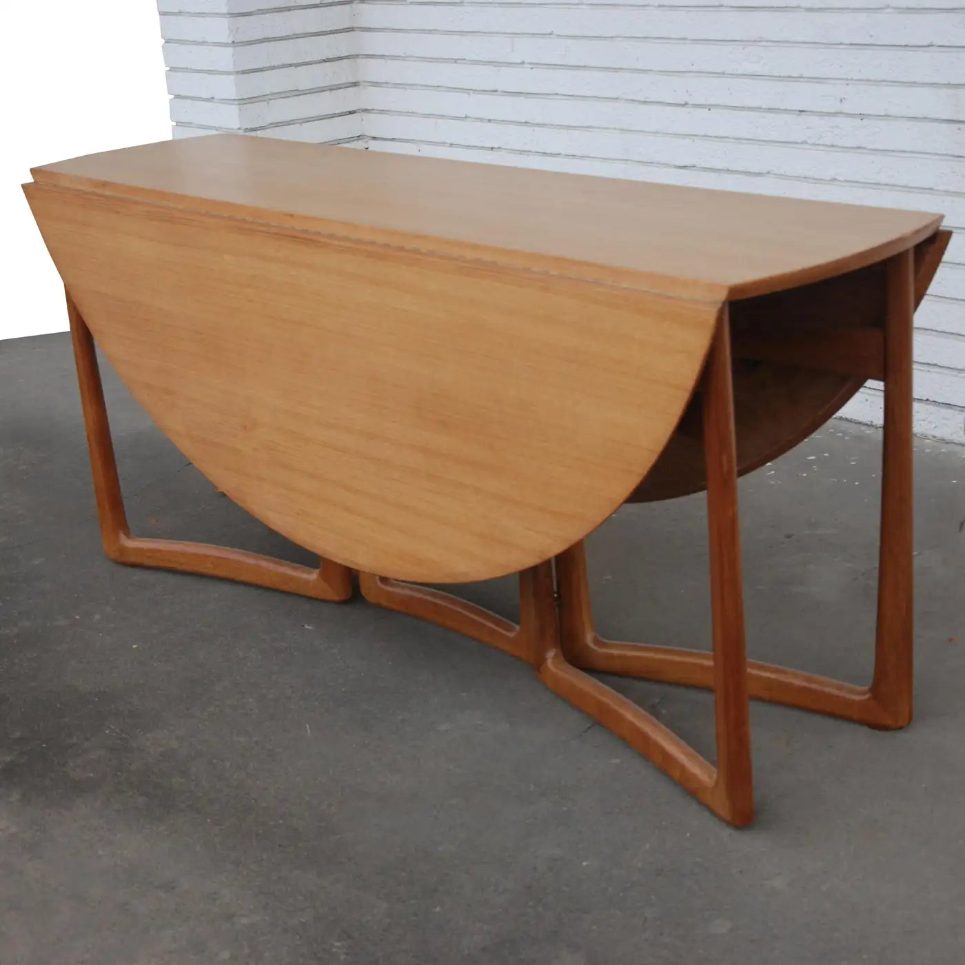 Vintage teak and brass dining table by Peter Hvidt
