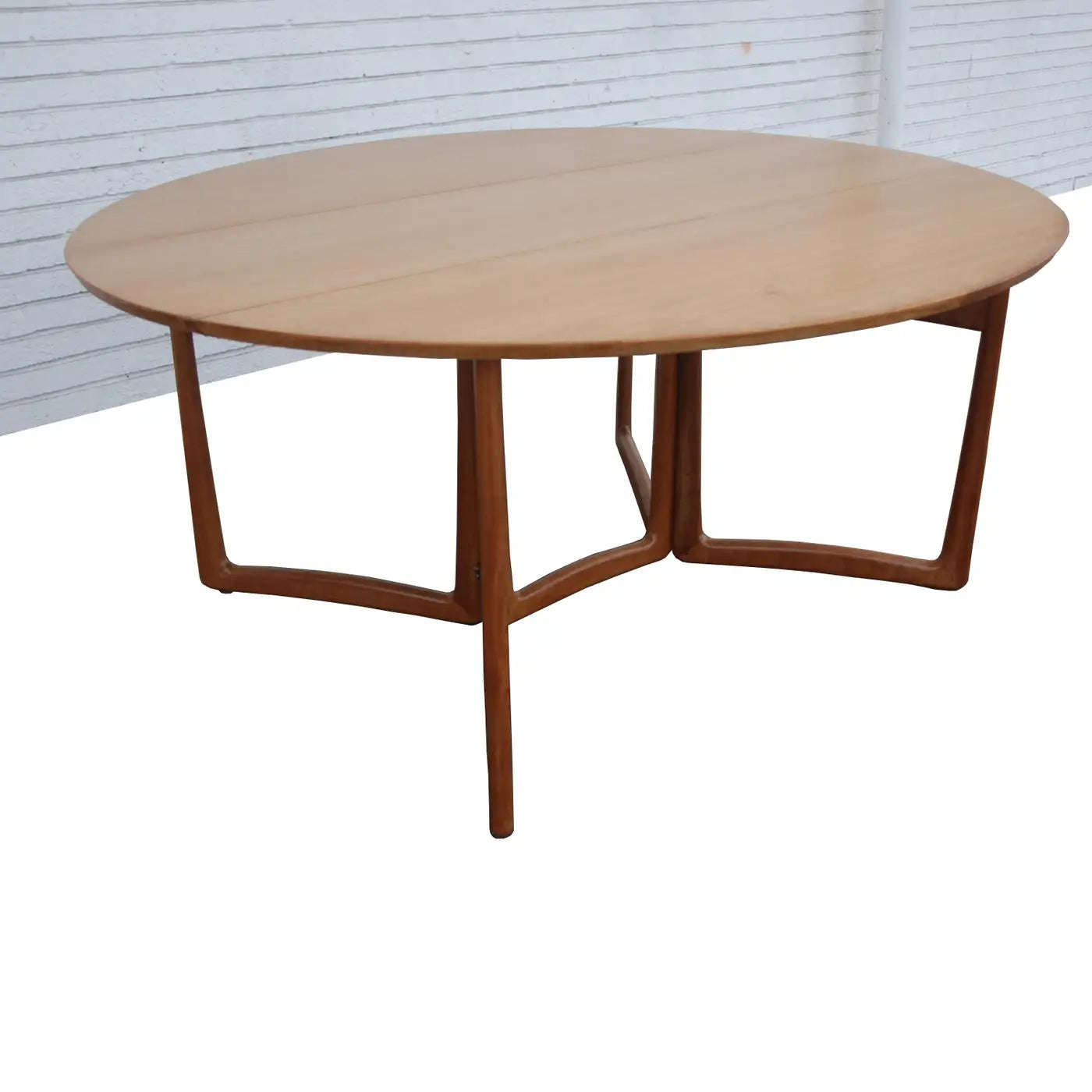 Danish drop-leaf dining table designed by Peter Hvidt
