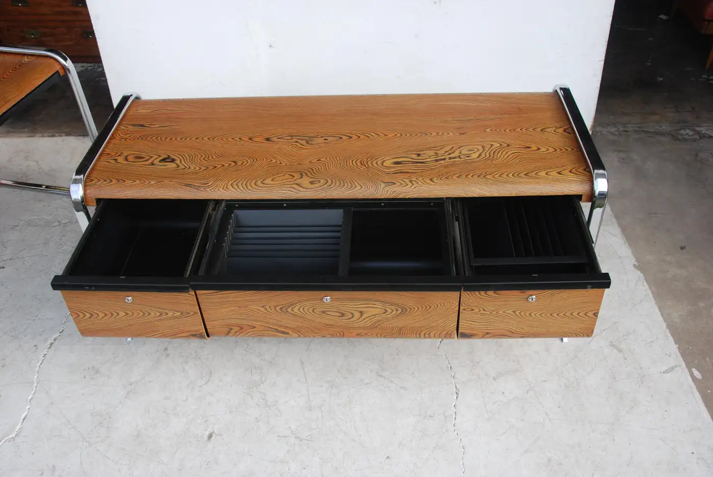 Designer Herman Miller credenza in Zebrawood and chrome finish