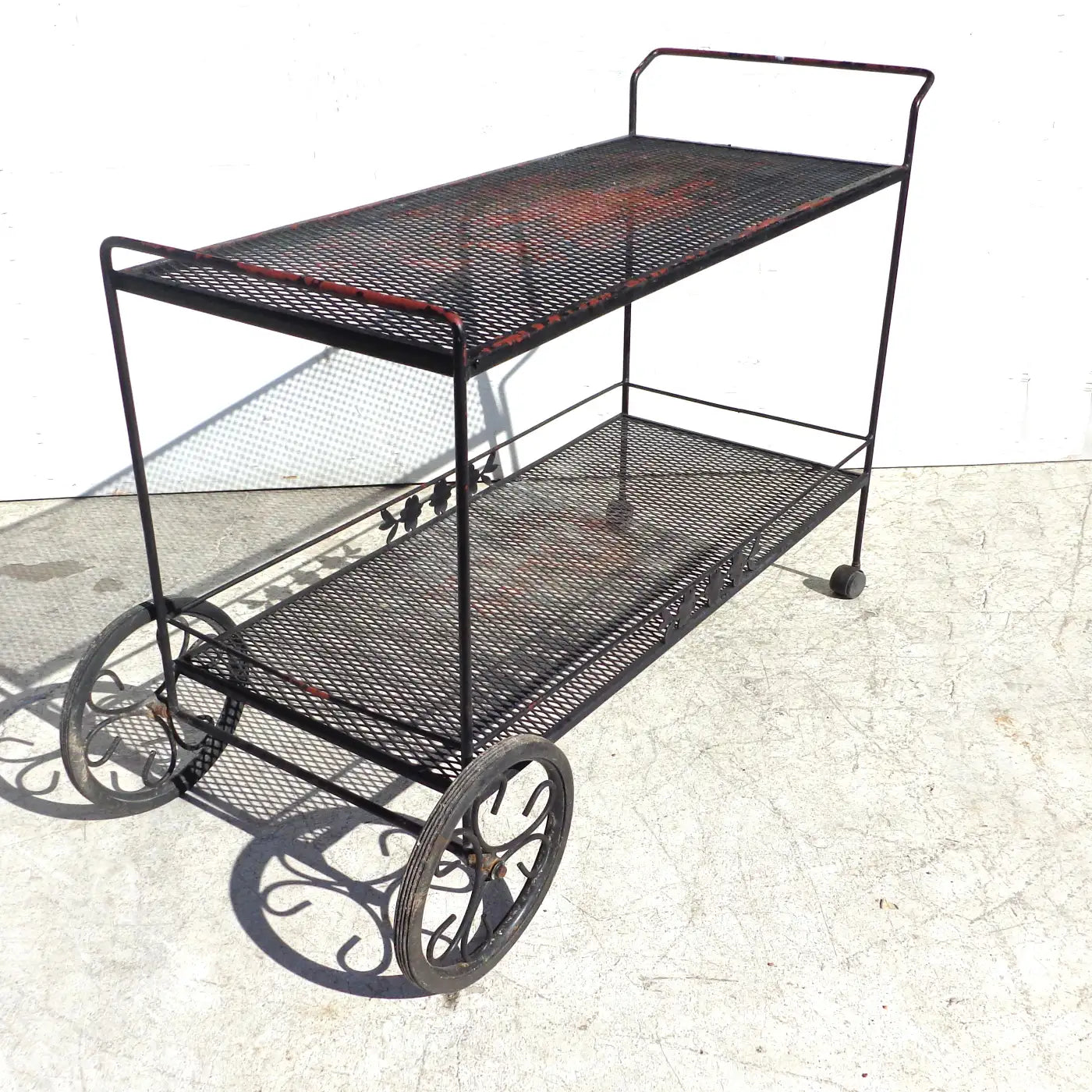 Metal serving cart with wheels by Woodard