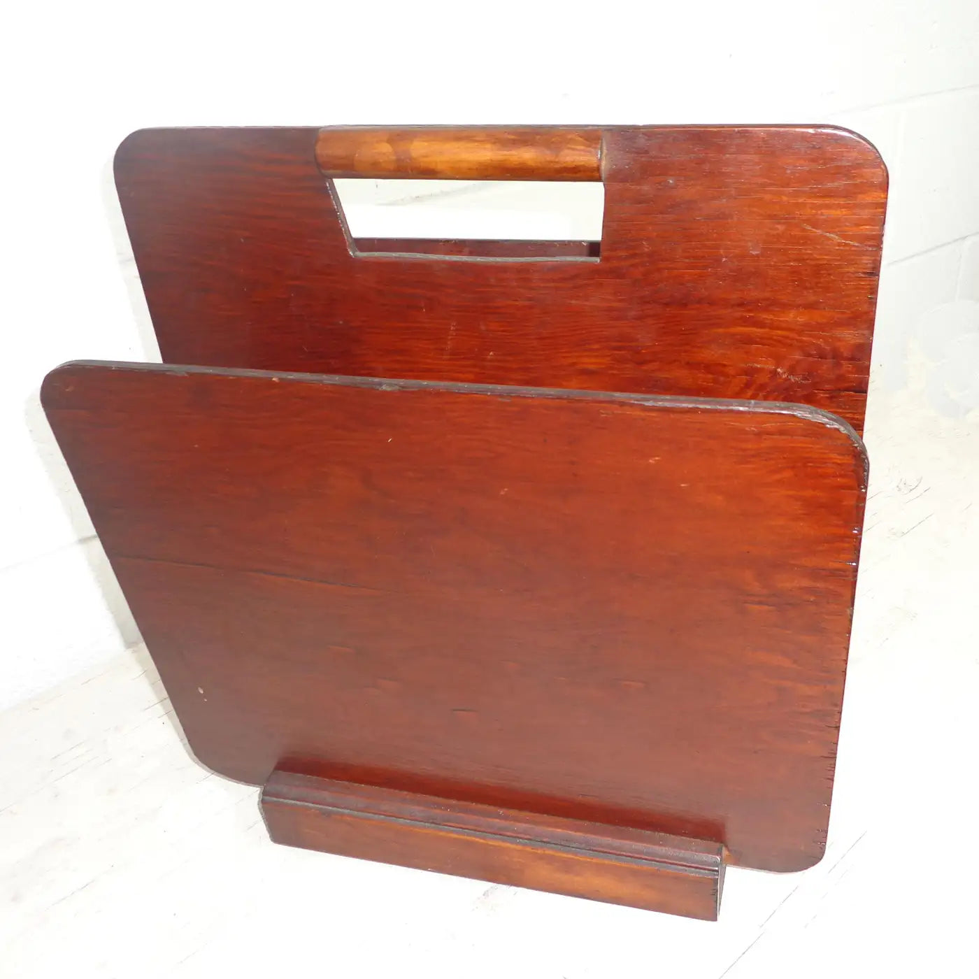 Decorative Art Deco magazine rack with sleek design