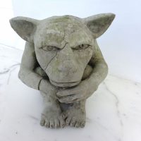 Vintage clay gargoyle statue with gothic style